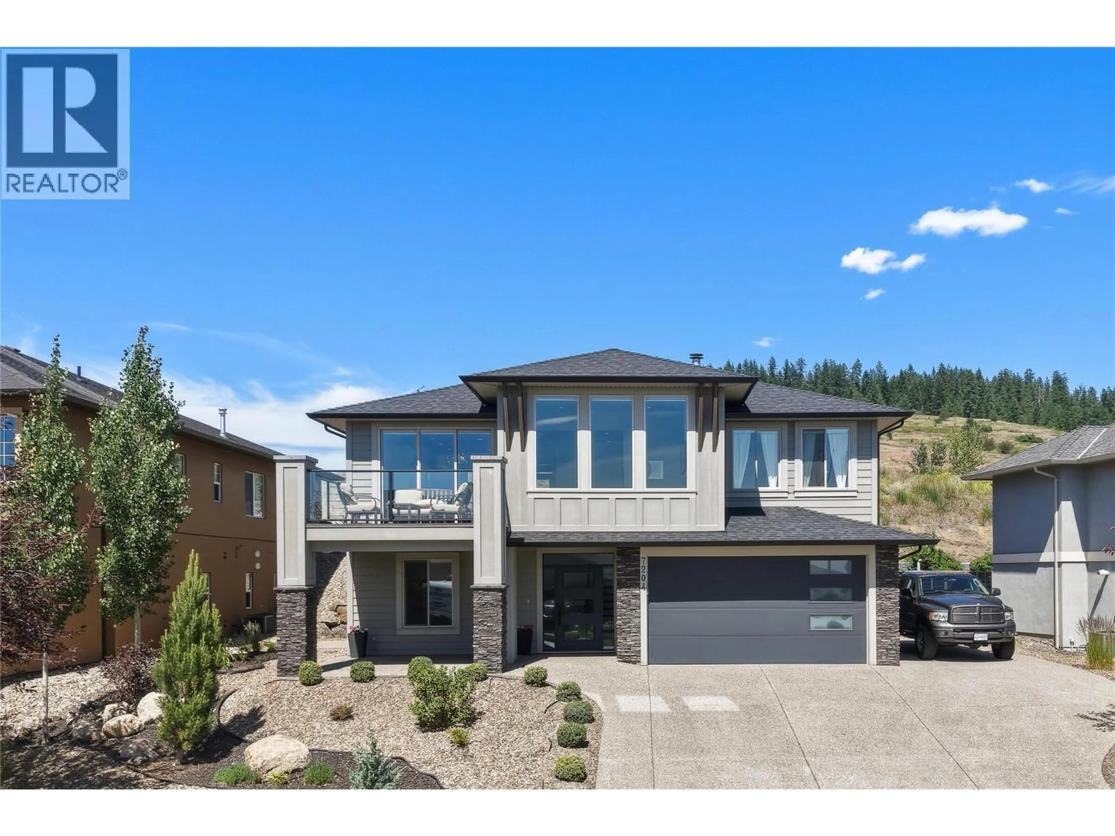 Home with brick exterior material, street for 7204 APEX DRIVE, Vernon British Columbia V1B4E4