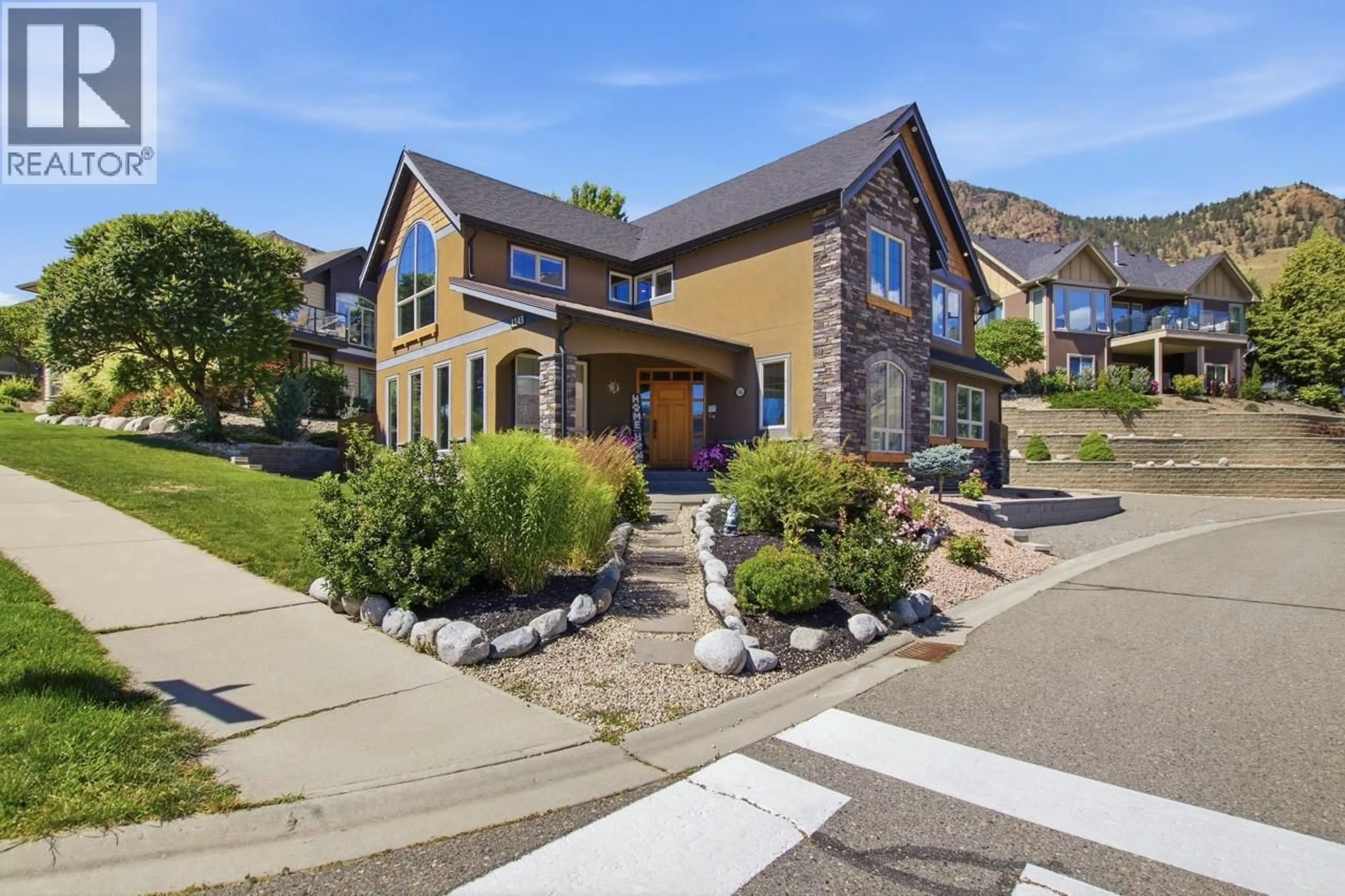 Home with brick exterior material, mountain view for 1143 CANYON RIDGE DRIVE, Kamloops British Columbia V2H0A1