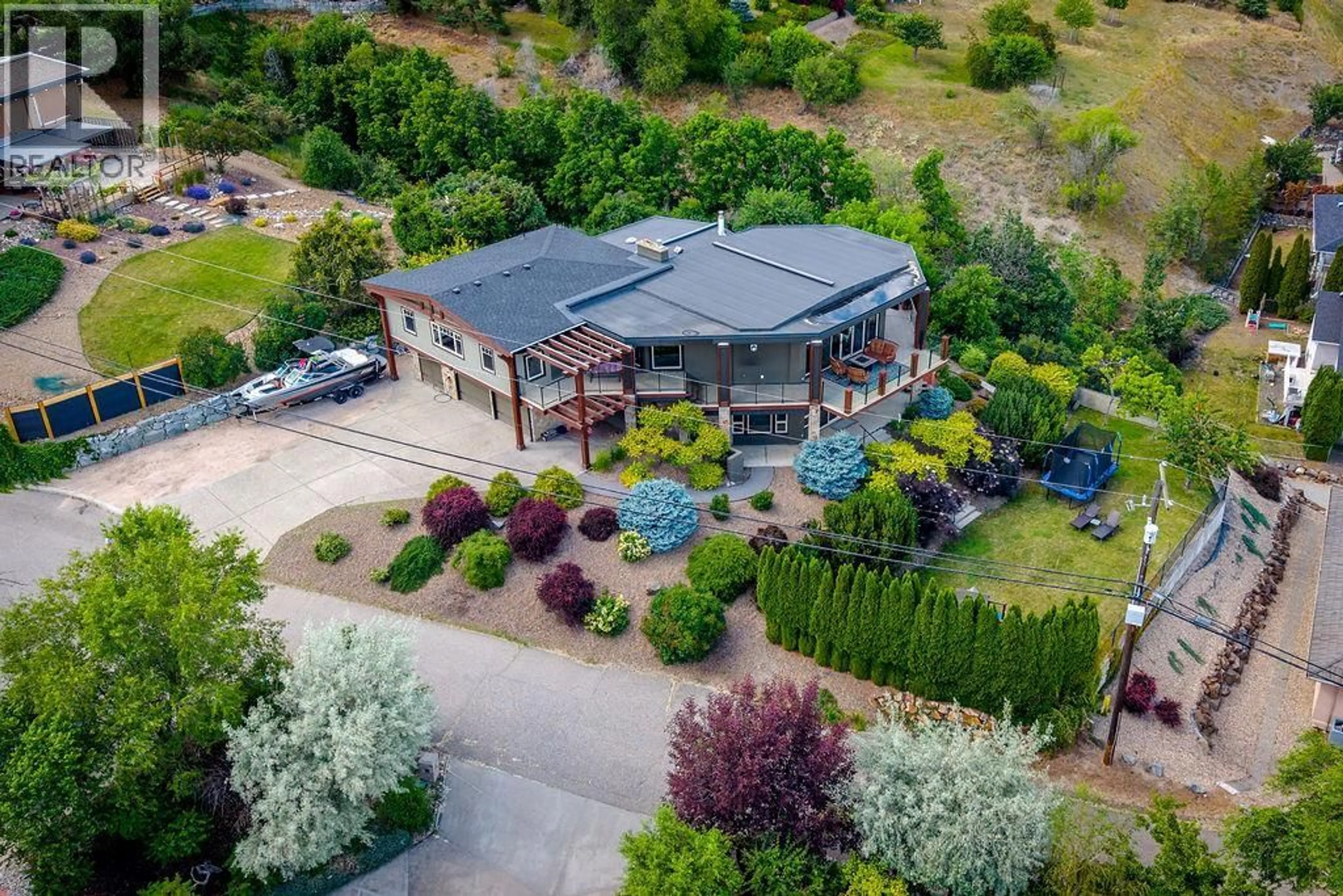 A pic from outside/outdoor area/front of a property/back of a property/a pic from drone, unknown for 13707 WATSON DRIVE, Coldstream British Columbia V1B1X7