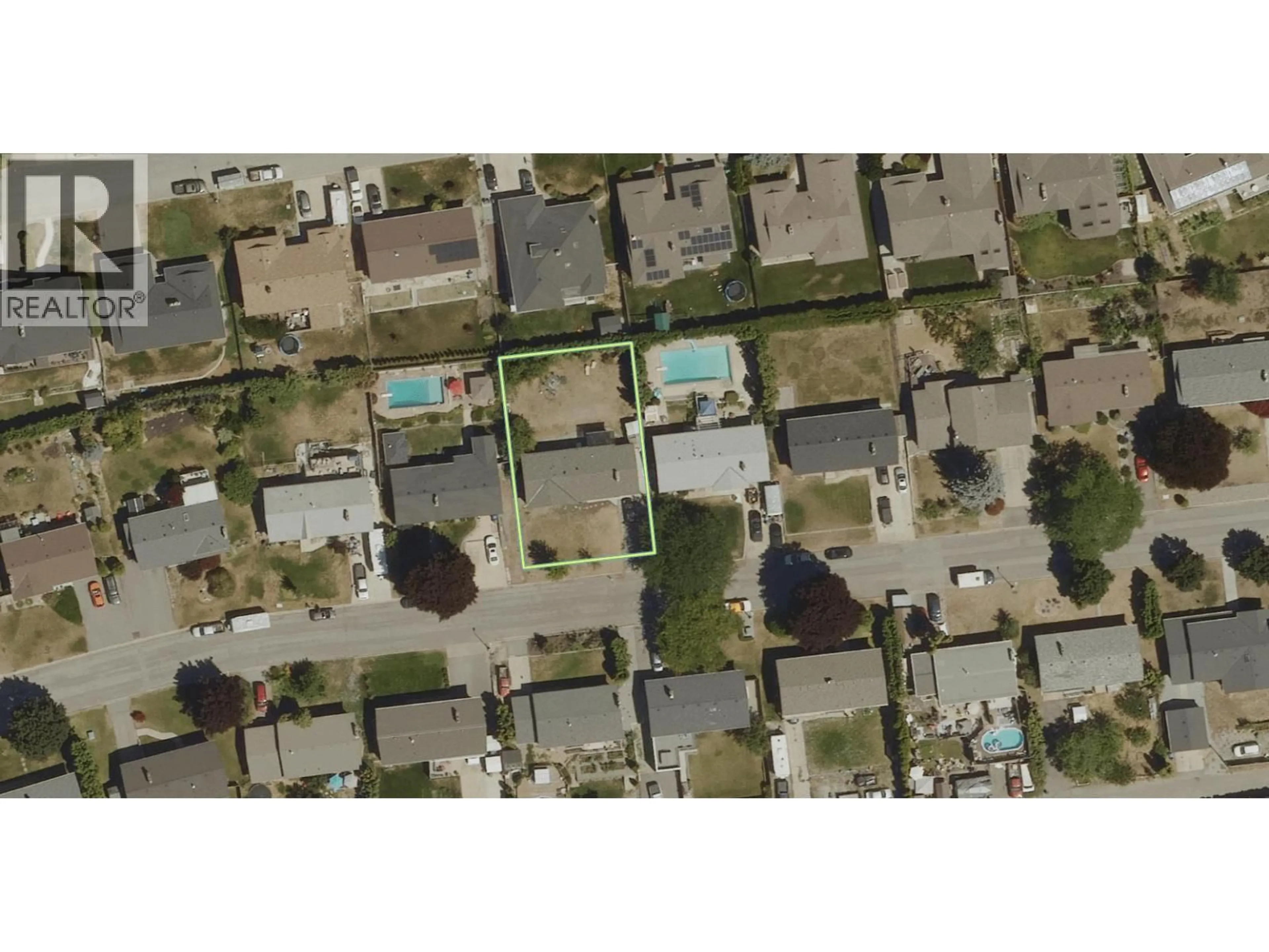 A pic from outside/outdoor area/front of a property/back of a property/a pic from drone, street for 1738 SMITHSON DRIVE, Kelowna British Columbia V1Y4E3