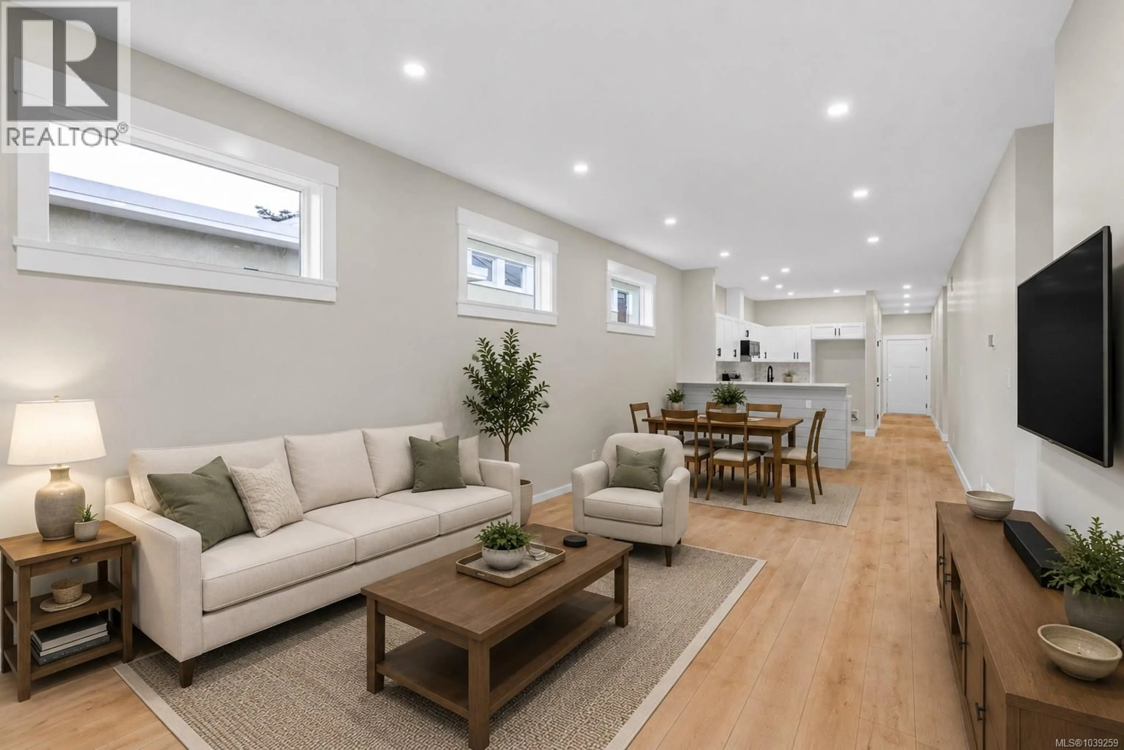 Living room with furniture, wood/laminate floor for 4721 ELIZABETH STREET, Port Alberni British Columbia V9Y6M1