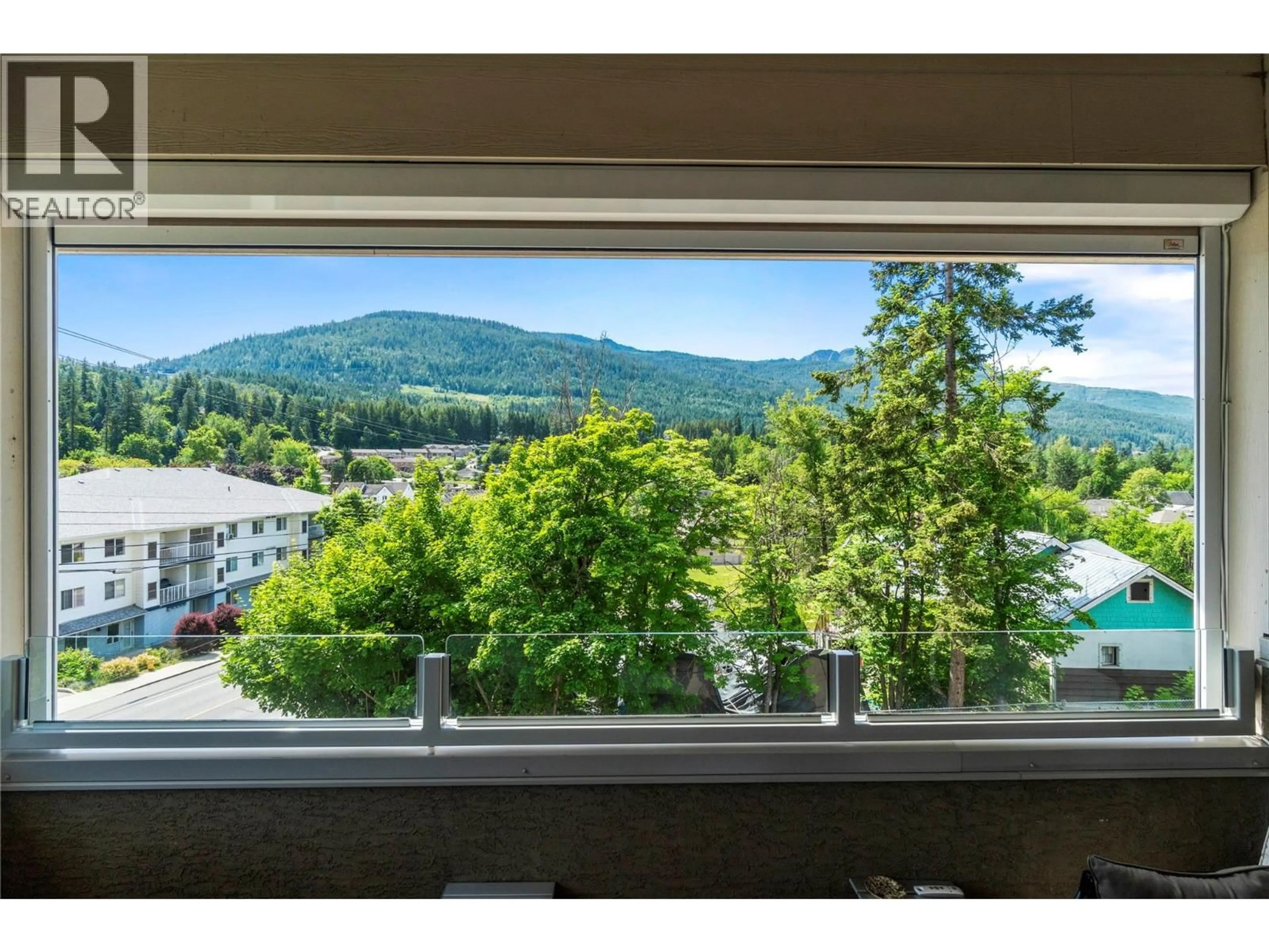 Balcony in the apartment, mountain view for 203 - 611 SHUSWAP STREET SOUTHWEST, Salmon Arm British Columbia V1E0A2
