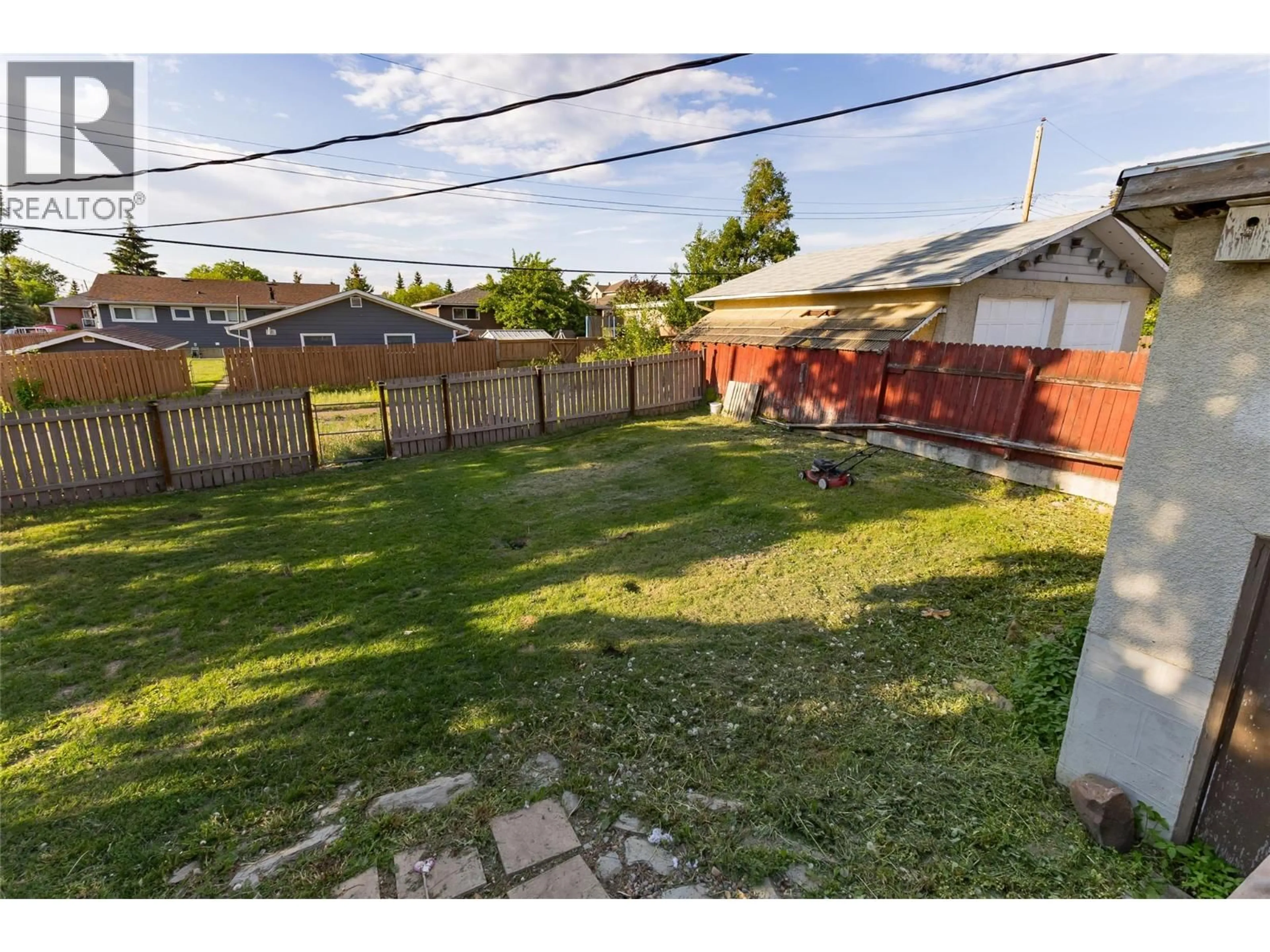 A pic from outside/outdoor area/front of a property/back of a property/a pic from drone, street for 416 96 AVENUE, Dawson Creek British Columbia V1G1K4