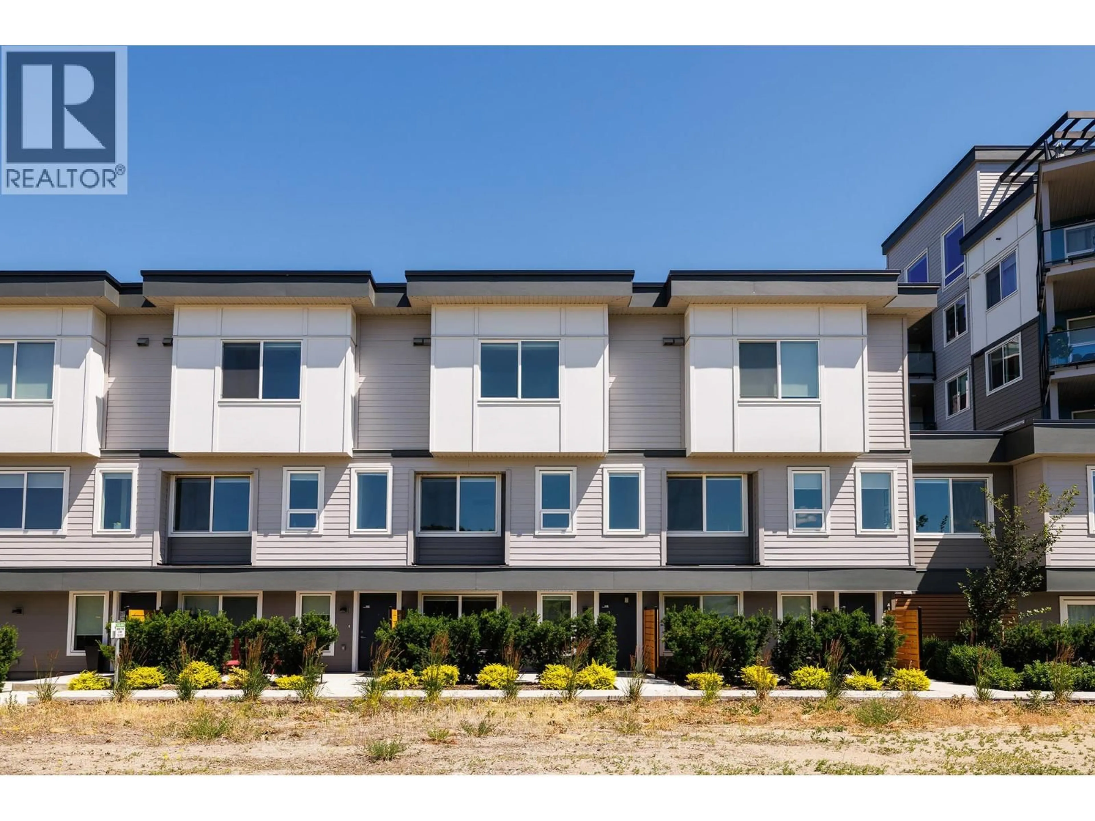 Home with vinyl exterior material, street for 103 - 3642 MISSION SPRINGS DRIVE, Kelowna British Columbia V1W0E1