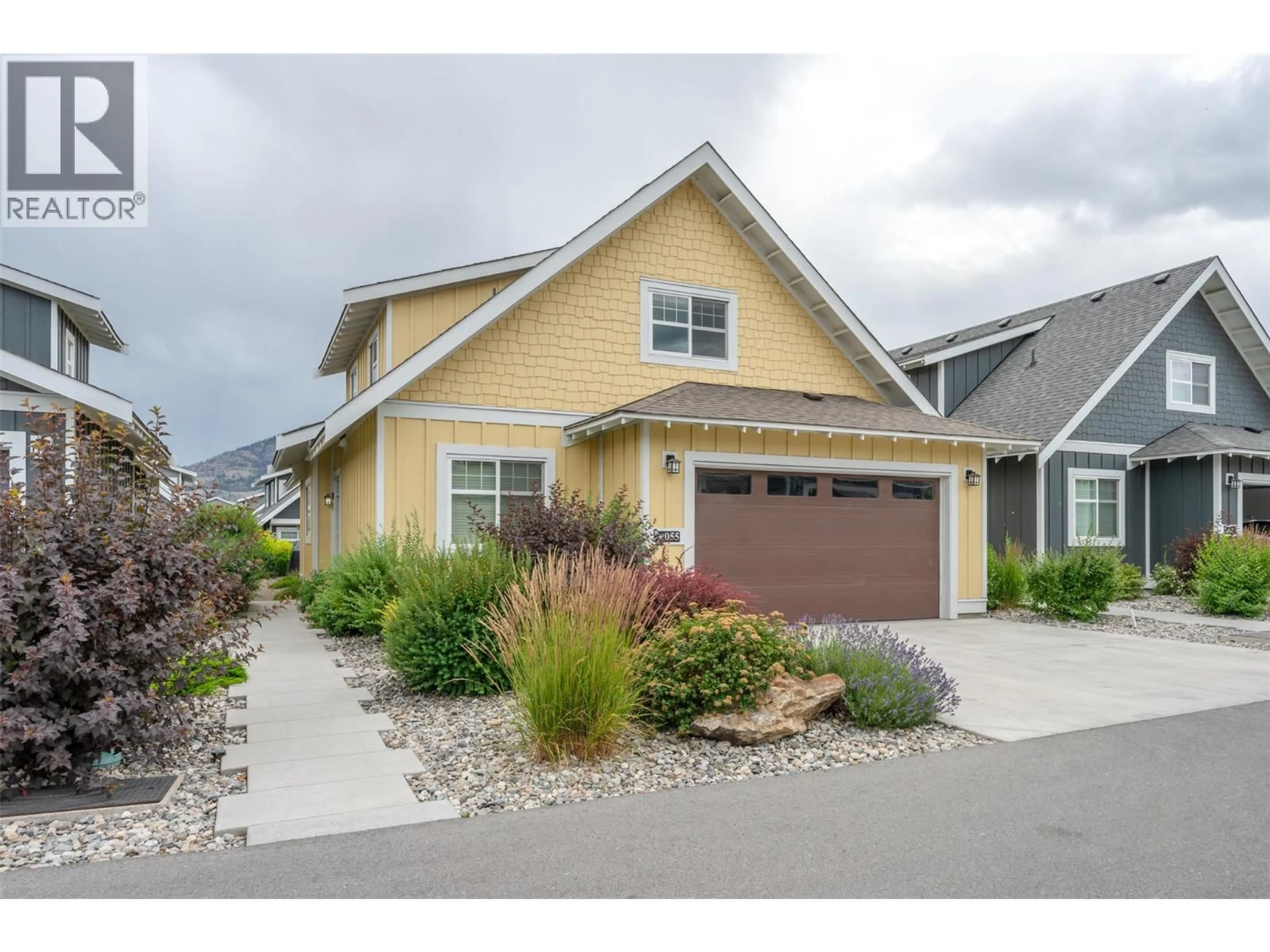 Home with vinyl exterior material, street for 55 - 2450 RADIO TOWER ROAD, Oliver British Columbia V0H1T1