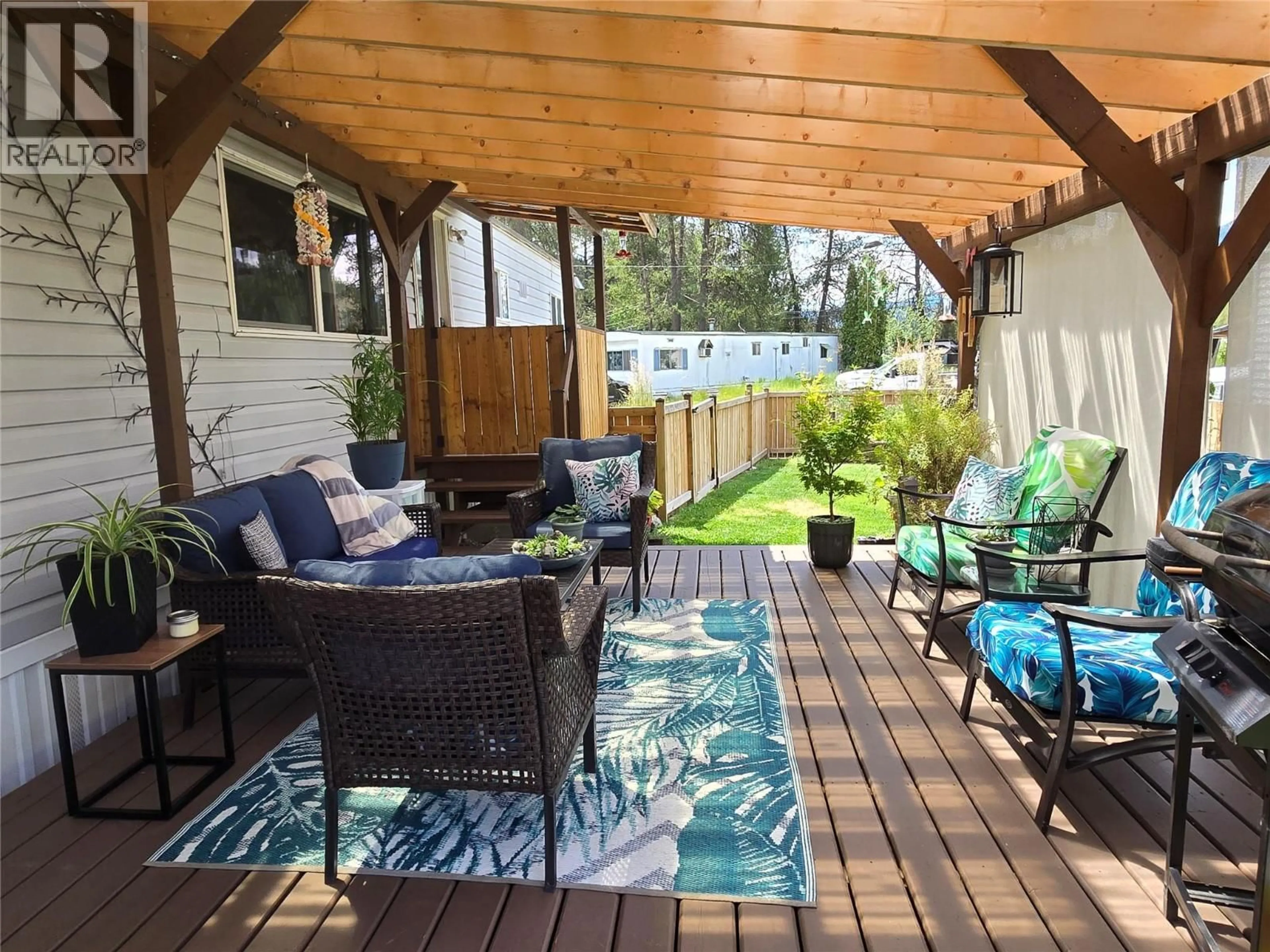 Patio, water/lake/river/ocean view for 12 - 500 16TH AVENUE, Genelle British Columbia V0G1G0