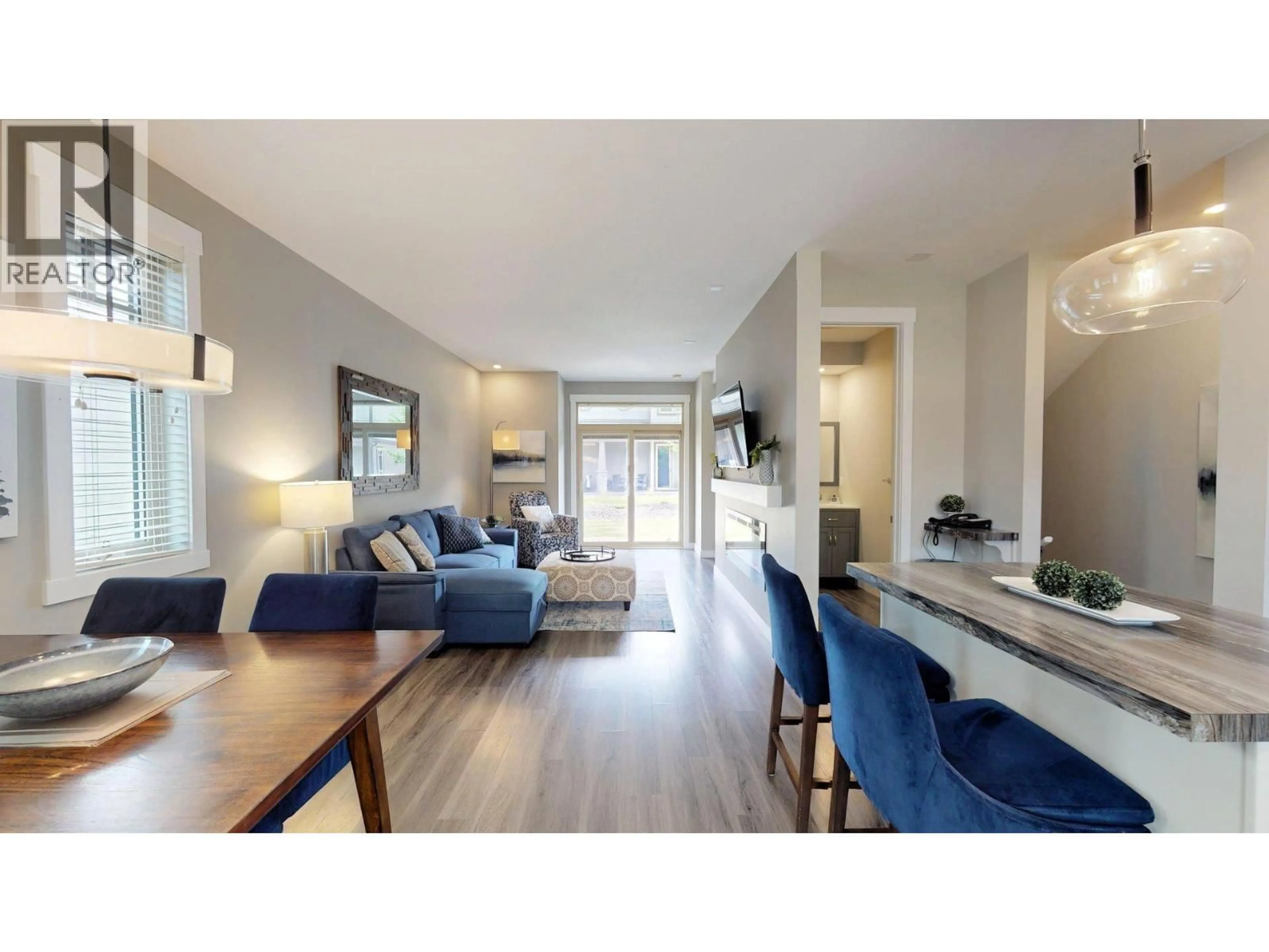 Living room with furniture, wood/laminate floor for 924 - 900 BIGHORN BOULEVARD, Radium Hot Springs British Columbia V0A1M0