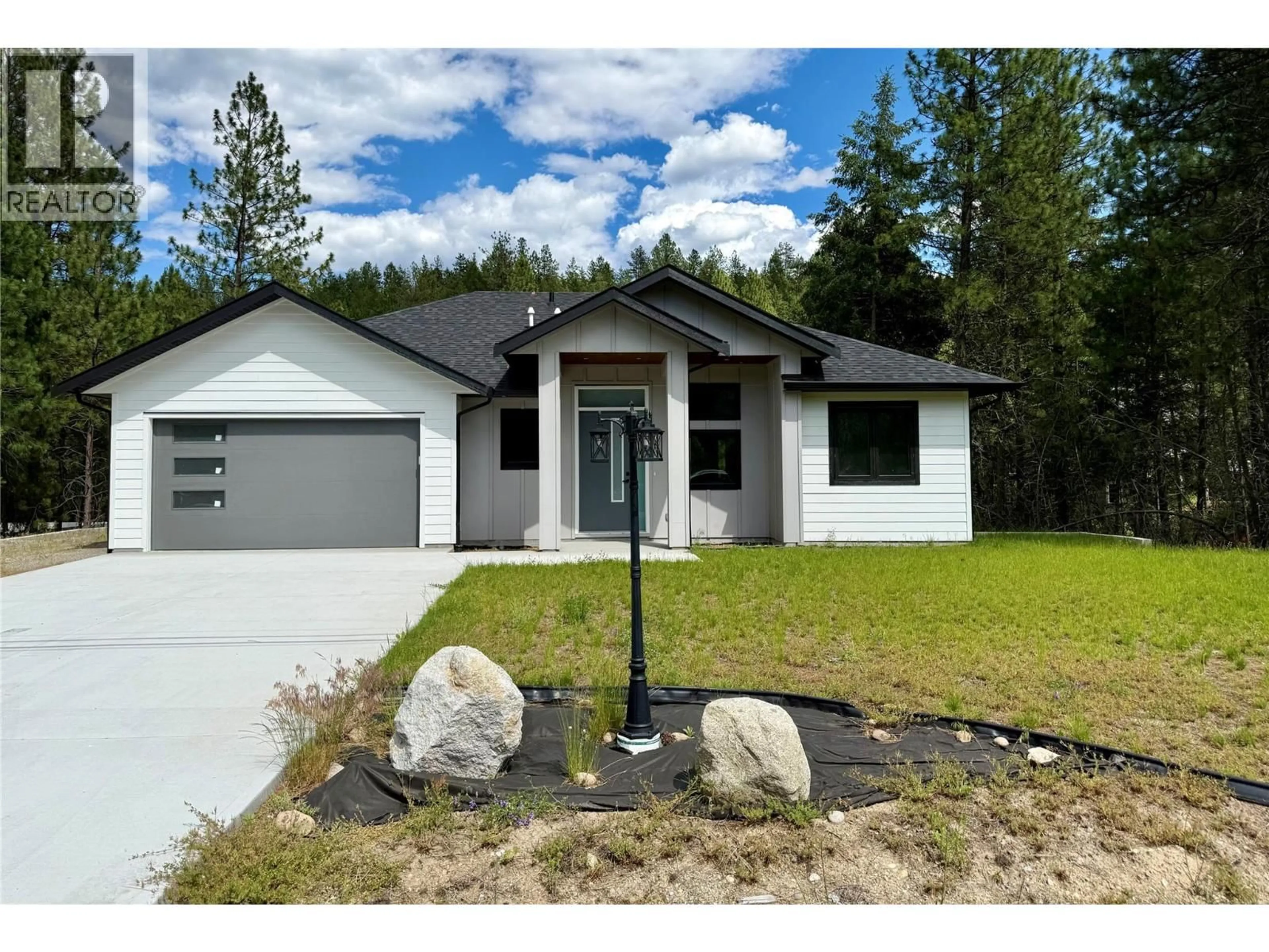 Home with vinyl exterior material, street for 245 PROSPECT DRIVE, Grand Forks British Columbia V0H1H2