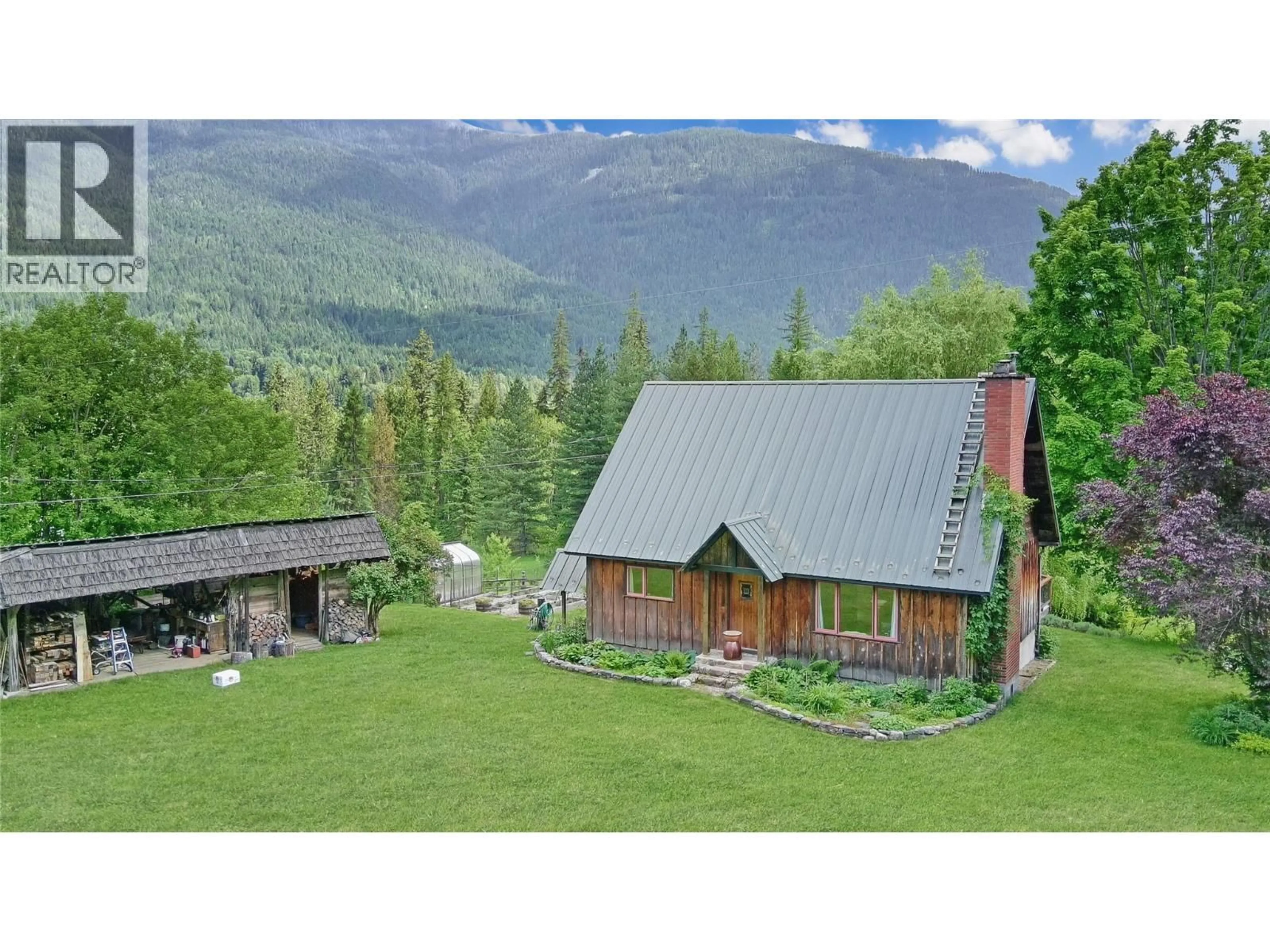 A pic from outside/outdoor area/front of a property/back of a property/a pic from drone, mountain view for 7421 AVIS ROAD, Winlaw British Columbia V0G2J0