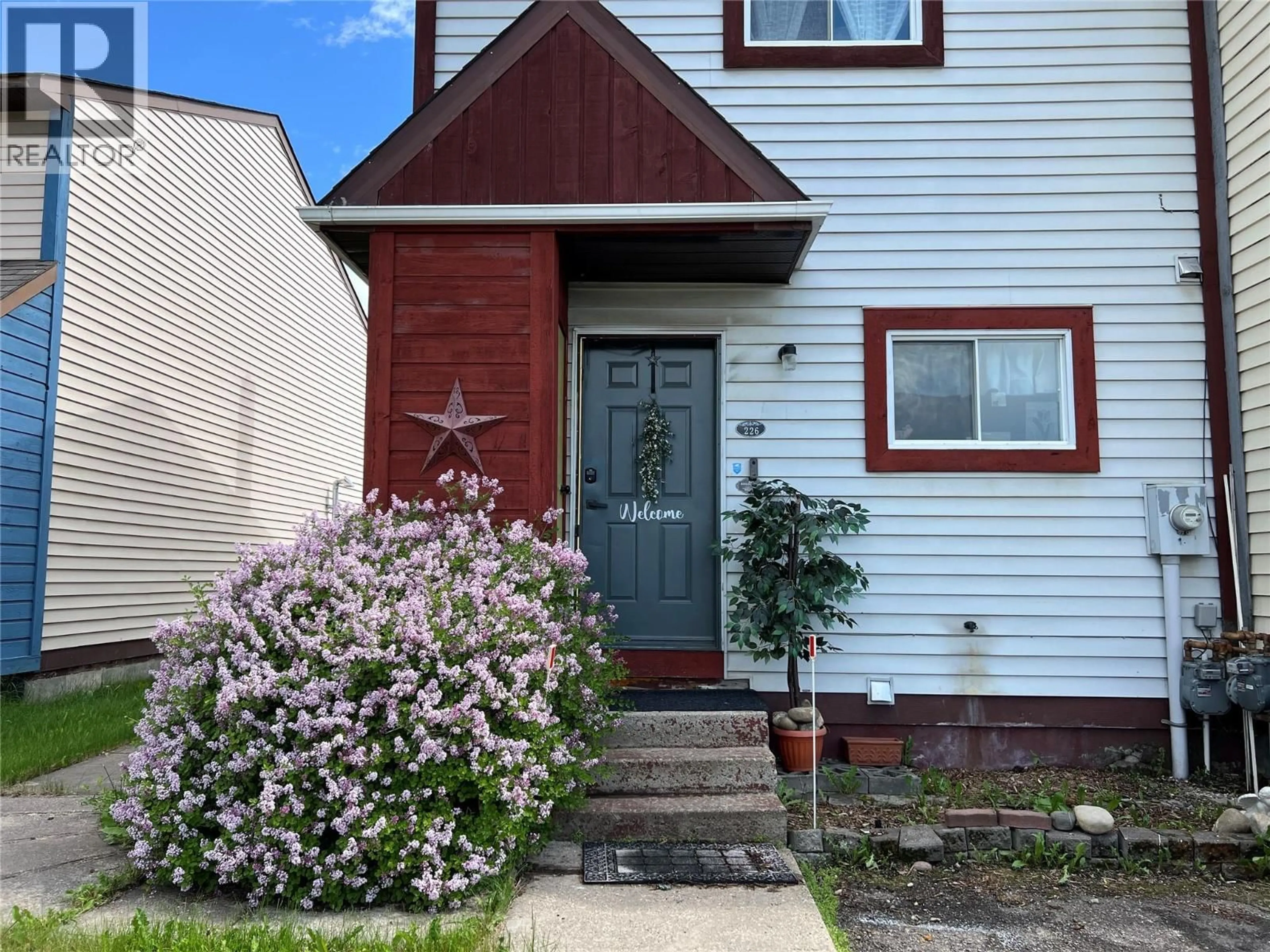 Home with vinyl exterior material, street for 226 SPIEKER AVENUE, Tumbler Ridge British Columbia V0C2W0