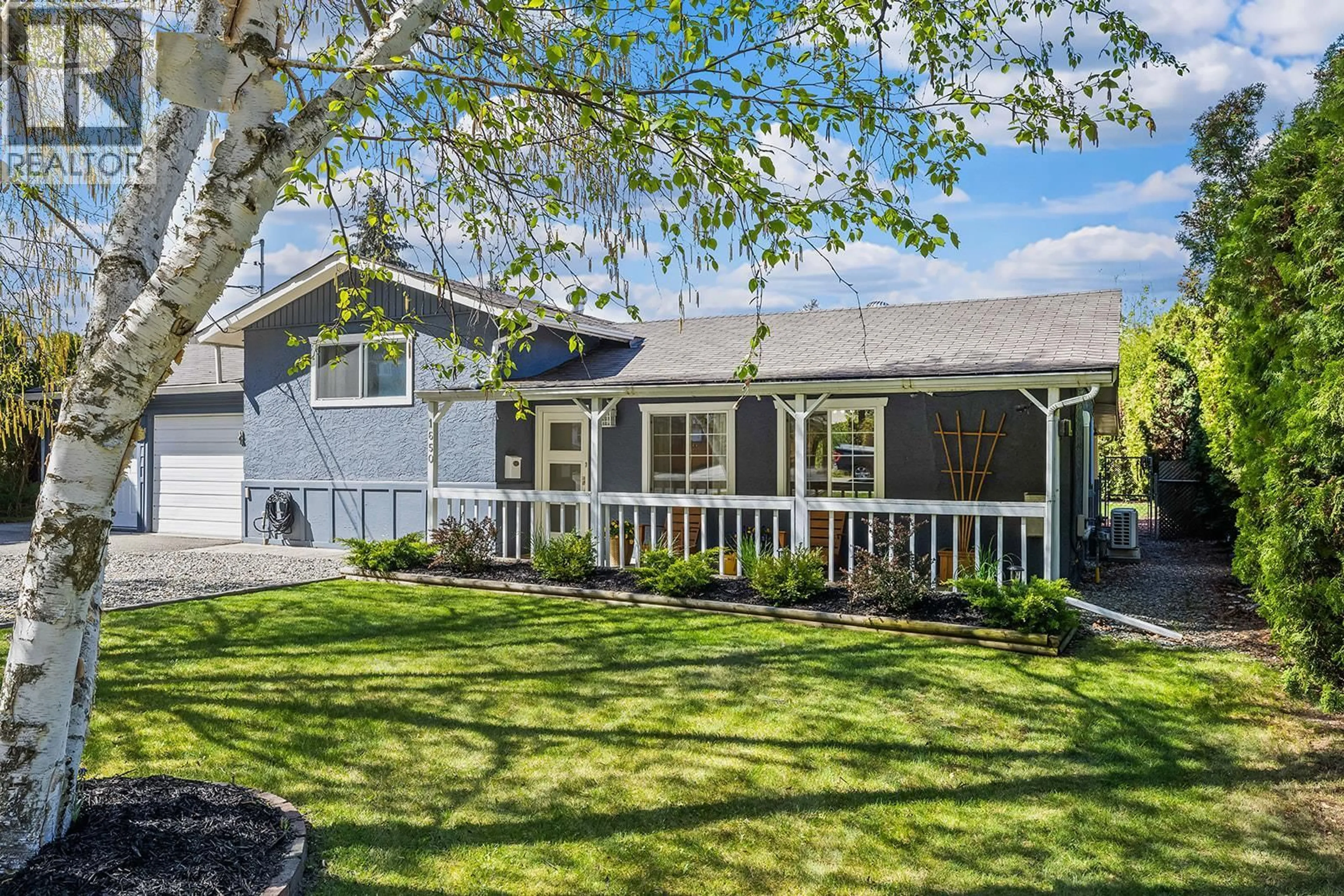 Home with vinyl exterior material, street for 1650 HOLLYWOOD ROAD SOUTH, Rutland British Columbia V1X4P3