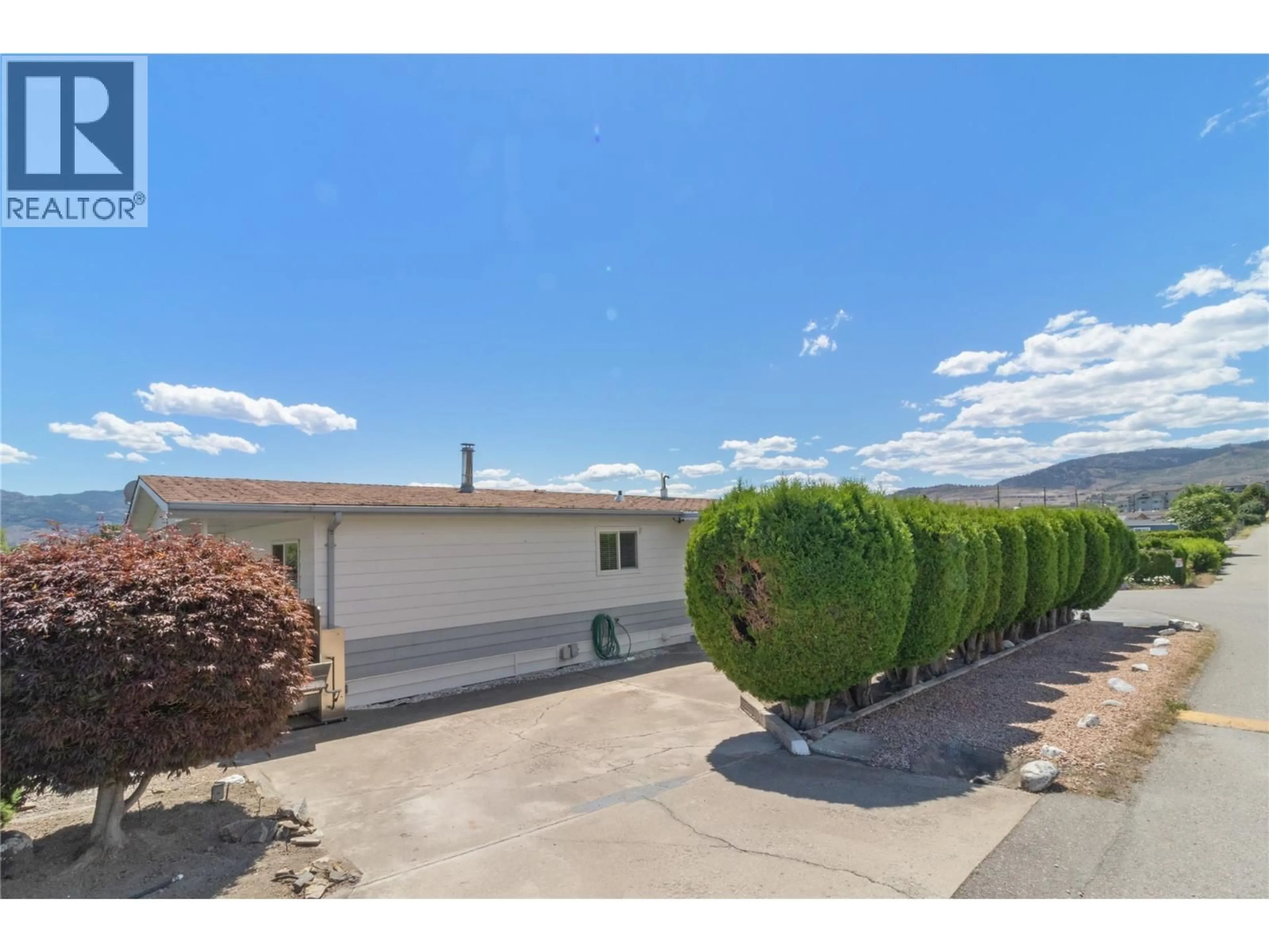 A pic from outside/outdoor area/front of a property/back of a property/a pic from drone, unknown for 44 - 2098 BOUCHERIE ROAD, West Kelowna British Columbia V4T2A5
