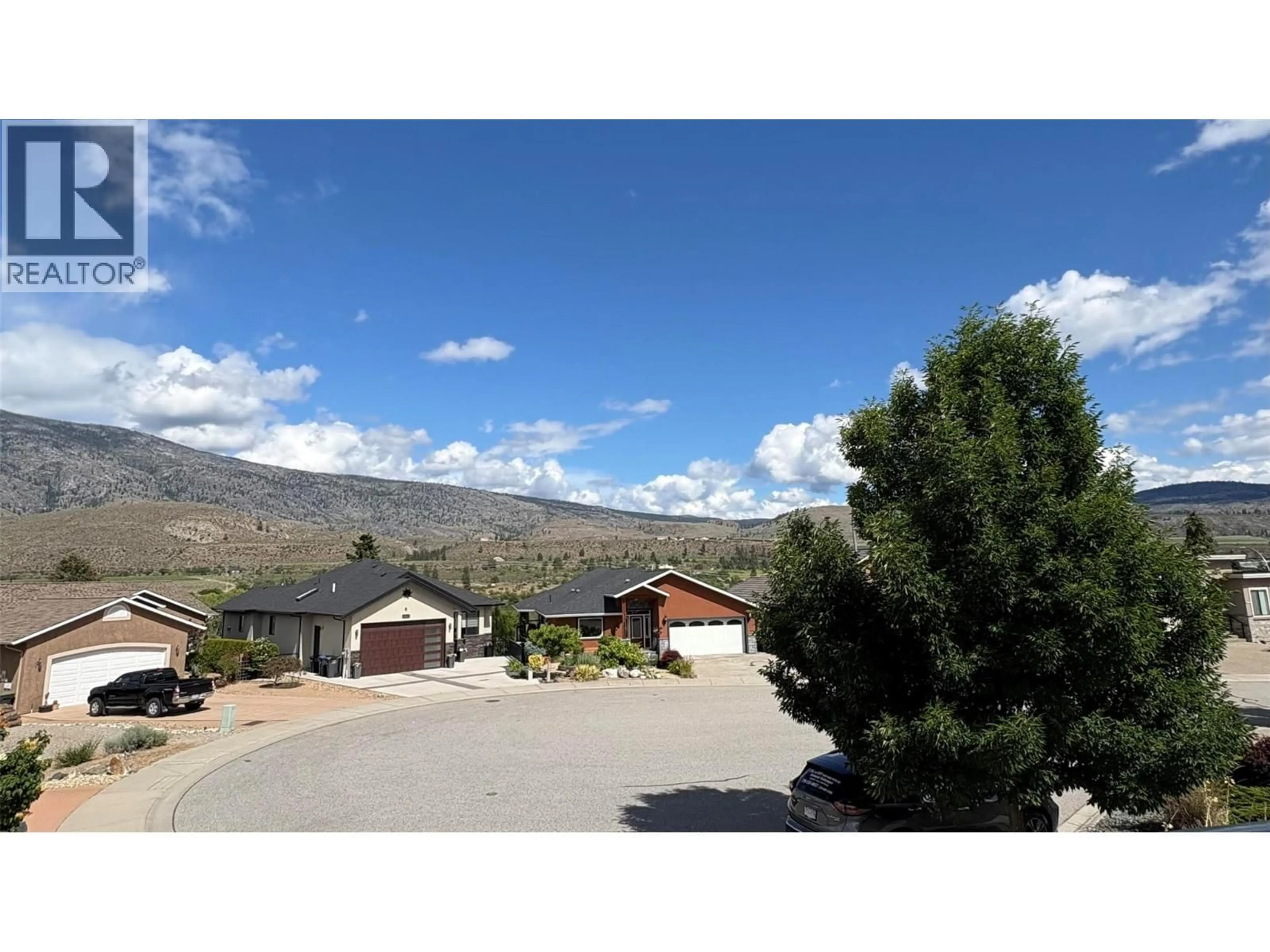 A pic from outside/outdoor area/front of a property/back of a property/a pic from drone, mountain view for 6940 CABERNET PLACE, Oliver British Columbia V0H1T4