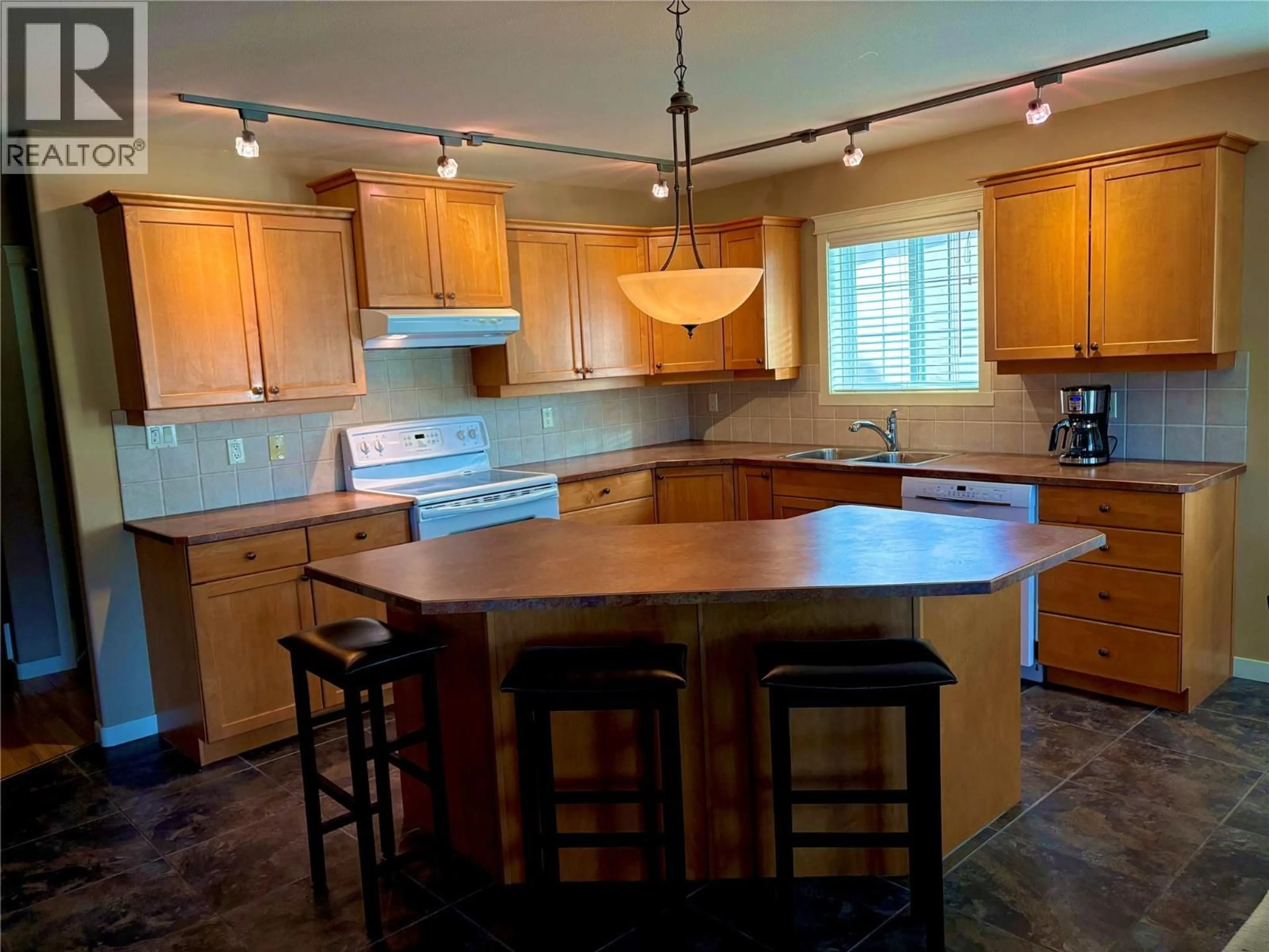 Open concept kitchen, unknown for 6940 CABERNET PLACE, Oliver British Columbia V0H1T4