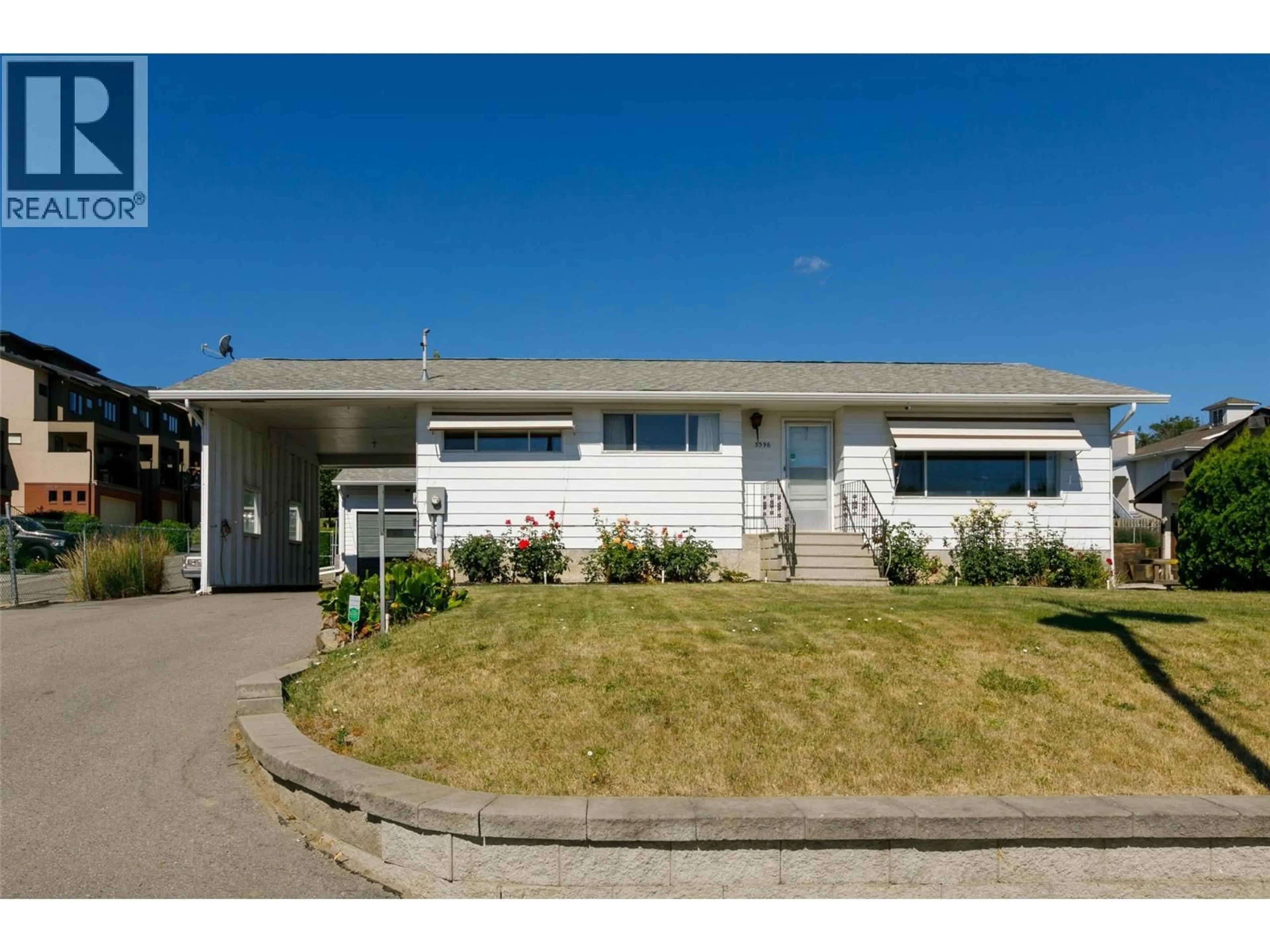 Home with vinyl exterior material, street for 3596 BROWN ROAD, West Kelowna British Columbia V4T1P5