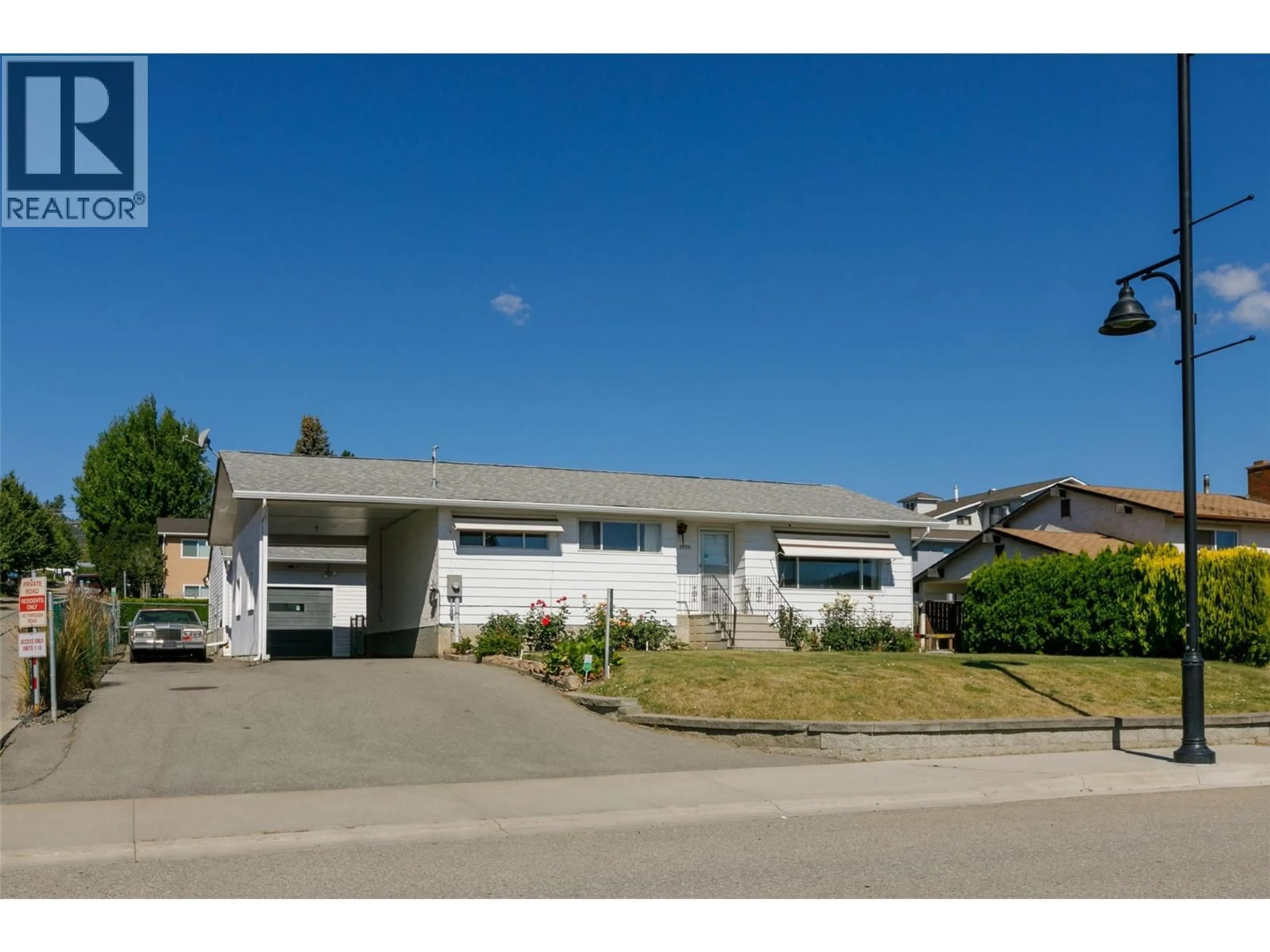 Home with vinyl exterior material, street for 3596 BROWN ROAD, West Kelowna British Columbia V4T1P5