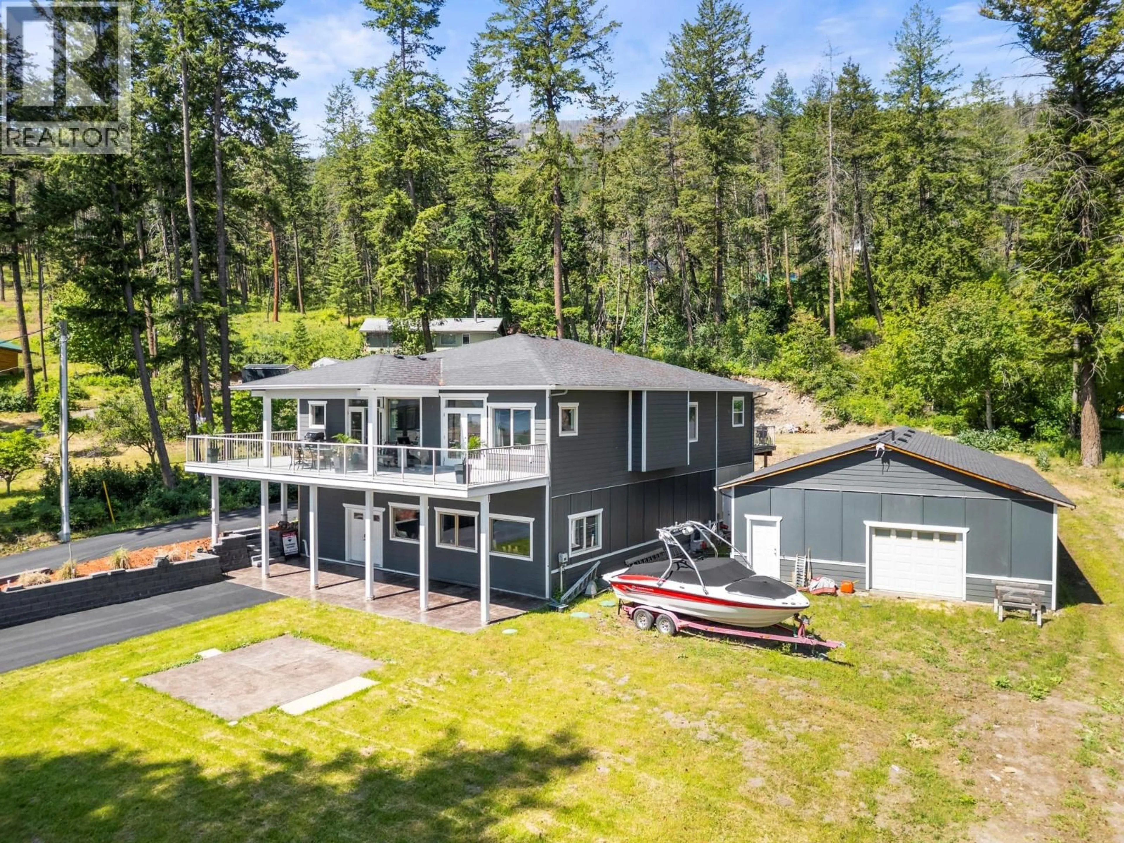 A pic from outside/outdoor area/front of a property/back of a property/a pic from drone, water/lake/river/ocean view for 70 LESTER ROAD, Vernon British Columbia V1H2G3