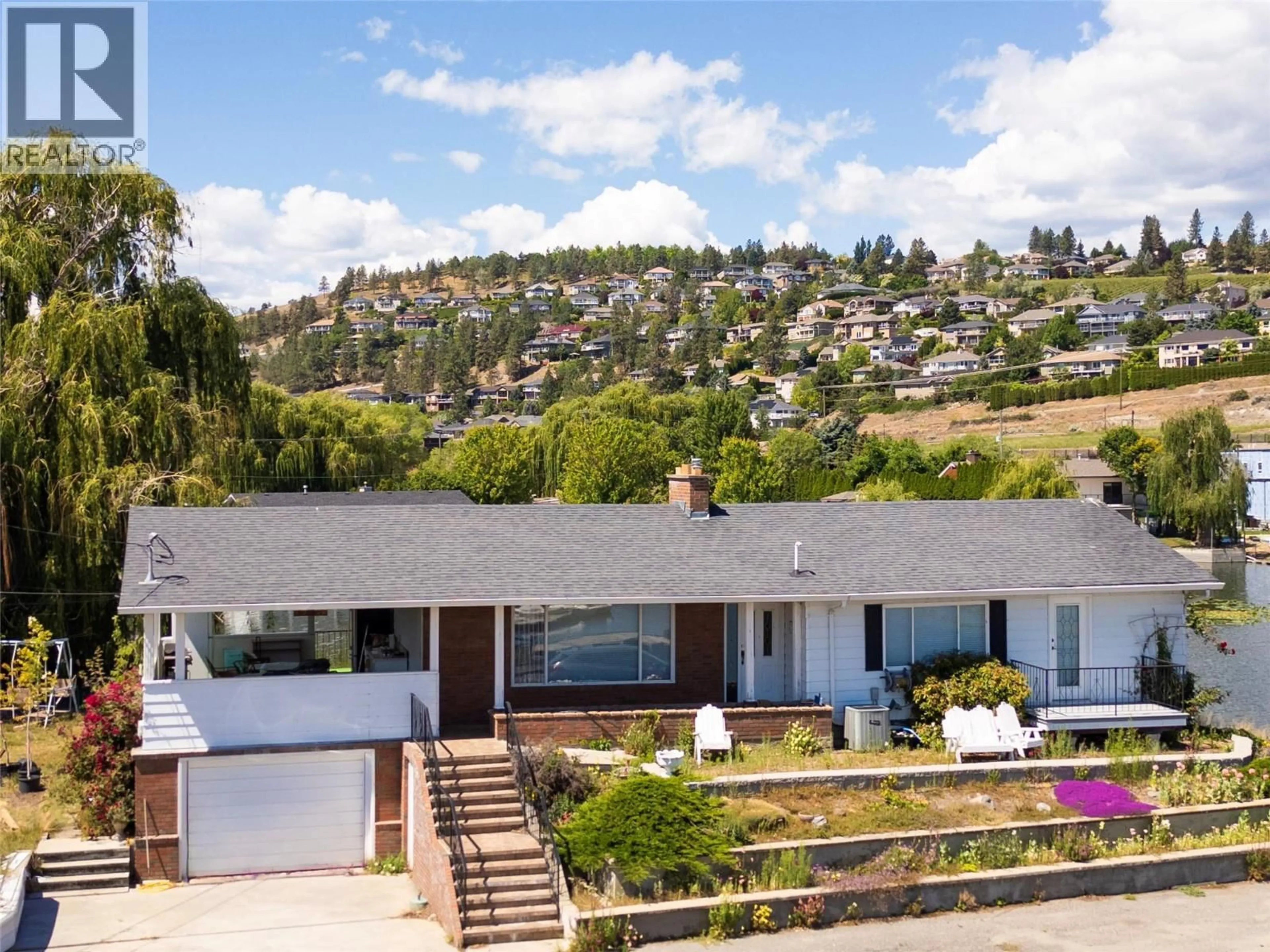 A pic from outside/outdoor area/front of a property/back of a property/a pic from drone, mountain view for 3582 WIIG ROAD, West Kelowna British Columbia V4T2B7