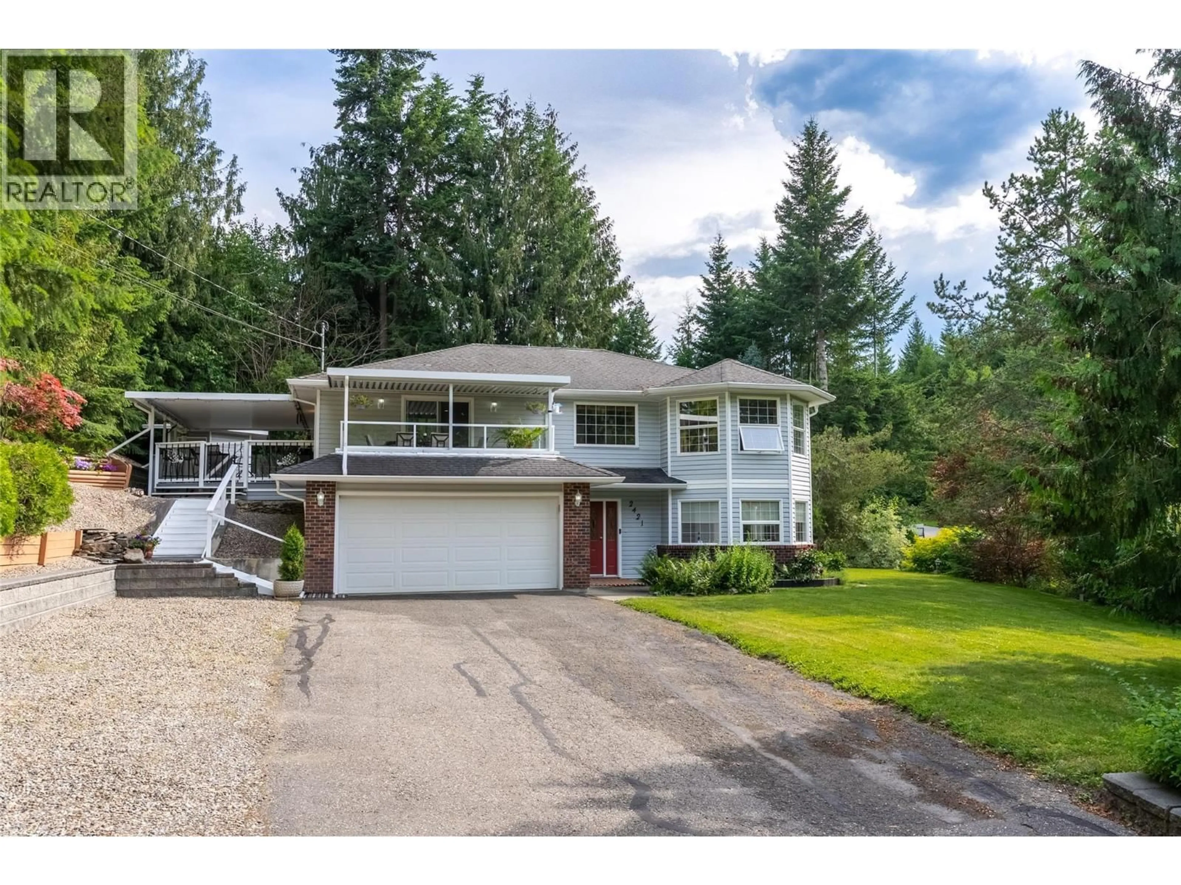 Home with vinyl exterior material, street for 2421 MOUNT TUAM CRESCENT, Sorrento British Columbia V0E2W2