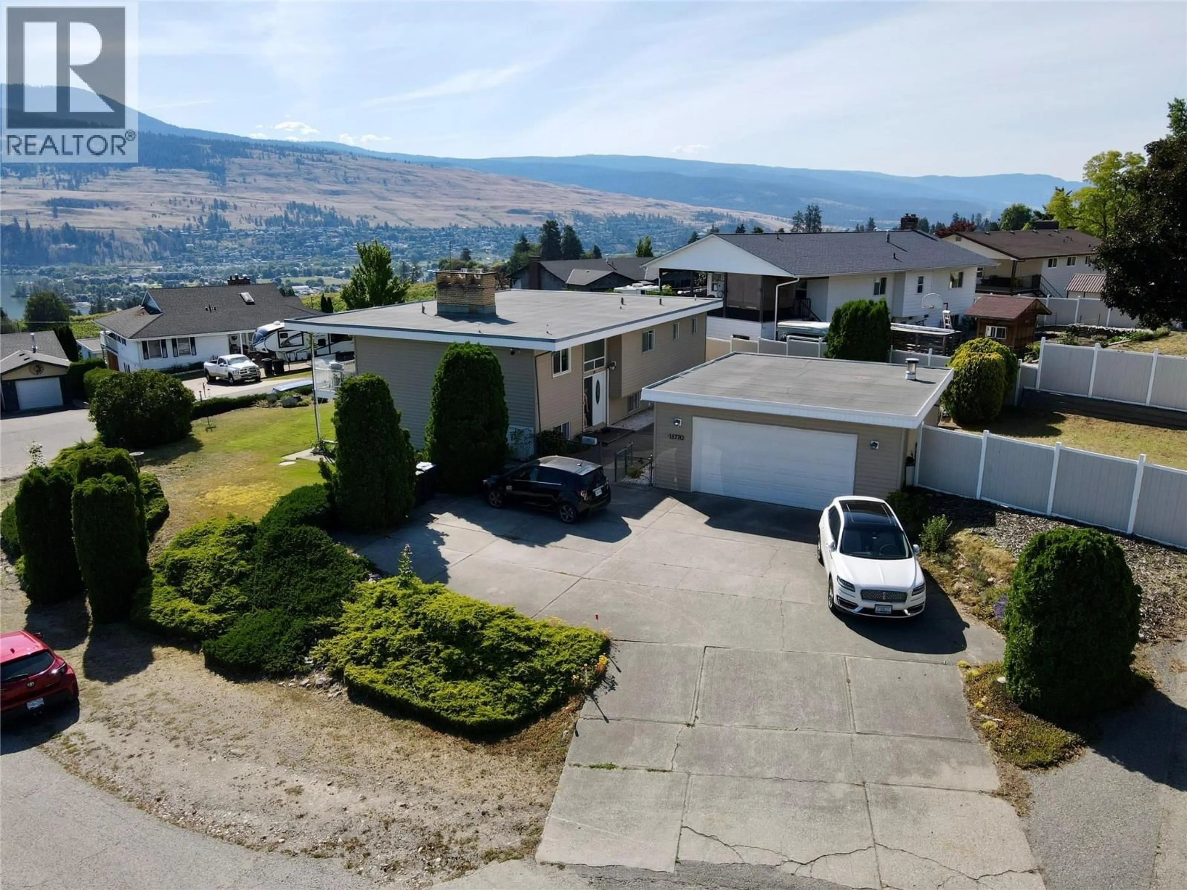 A pic from outside/outdoor area/front of a property/back of a property/a pic from drone, mountain view for 11770 DANIEL DRIVE, Lake Country British Columbia V4V1J3