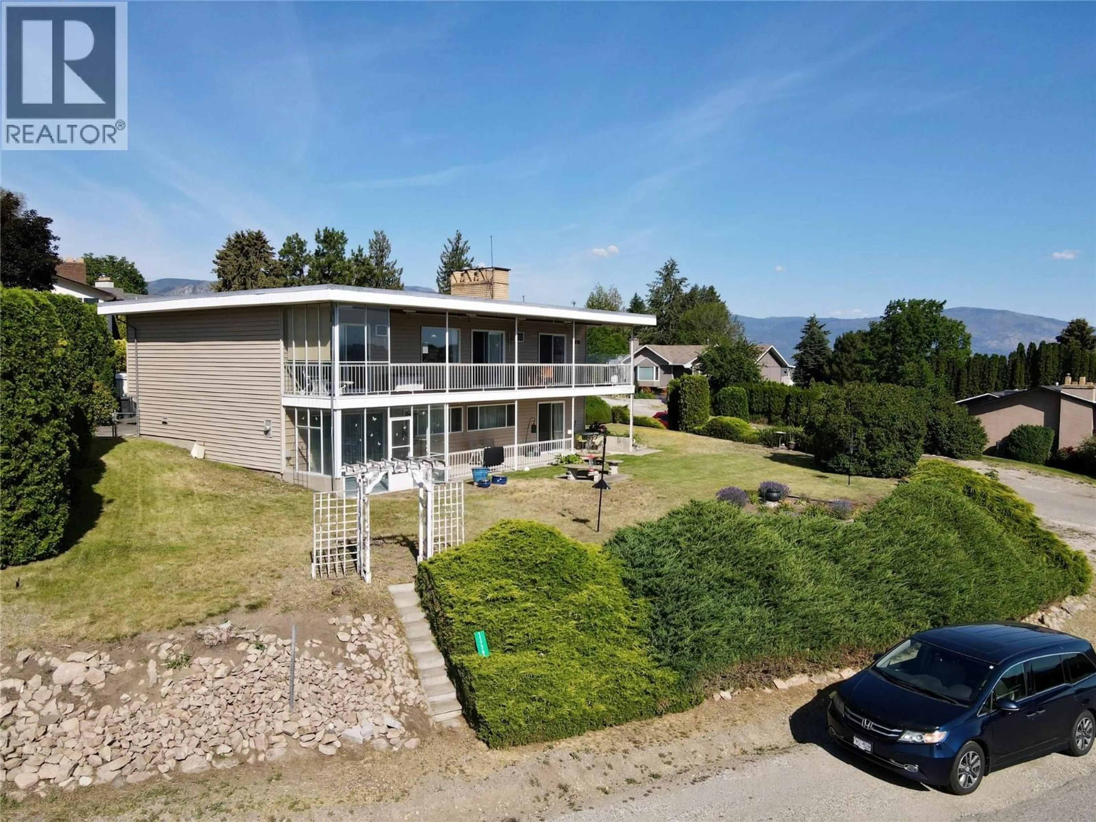 A pic from outside/outdoor area/front of a property/back of a property/a pic from drone, water/lake/river/ocean view for 11770 DANIEL DRIVE, Lake Country British Columbia V4V1J3