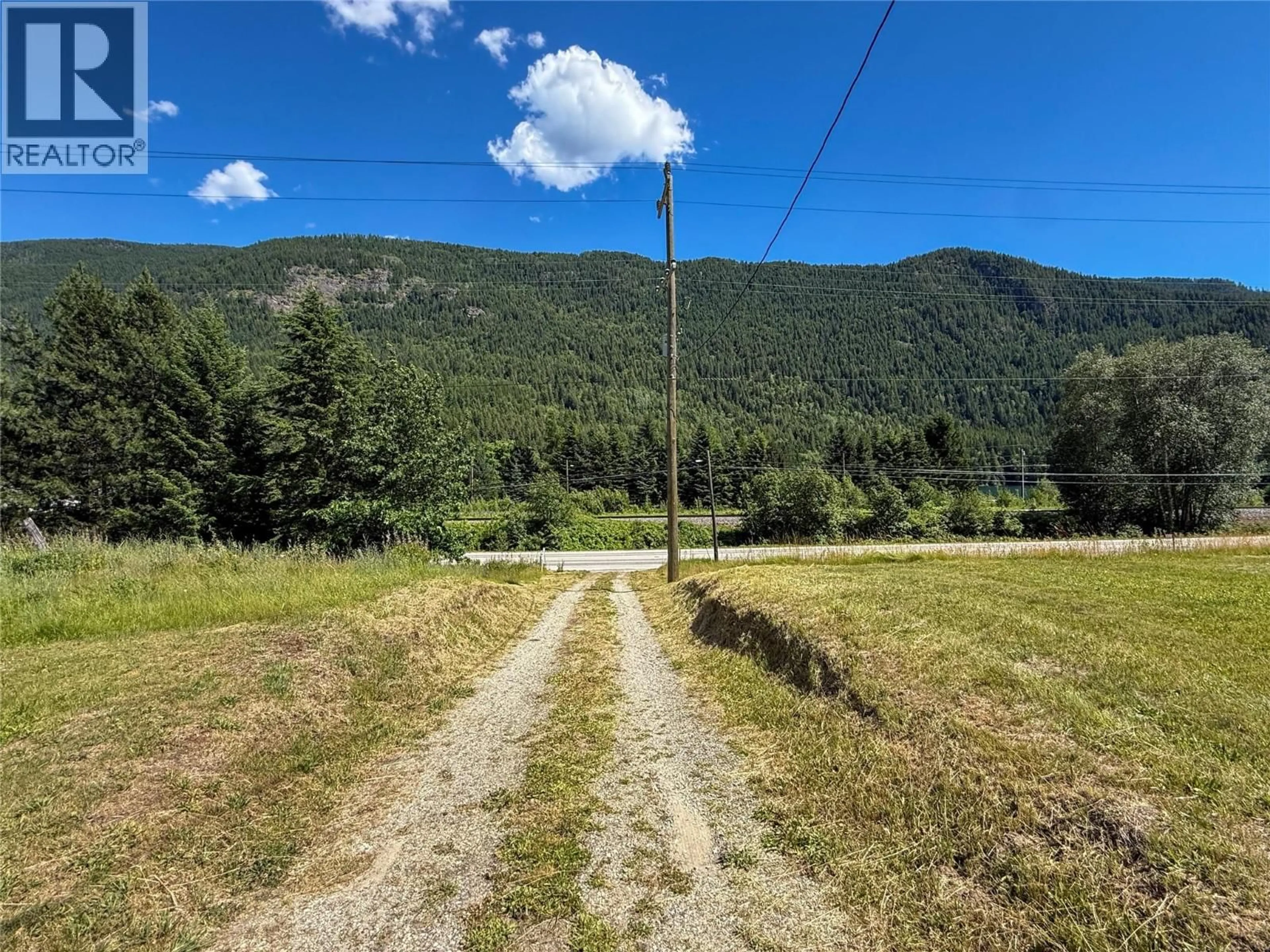 A pic from outside/outdoor area/front of a property/back of a property/a pic from drone, mountain view for 1535 HIGHWAY 3A HIGHWAY, Thrums British Columbia V1N4M7