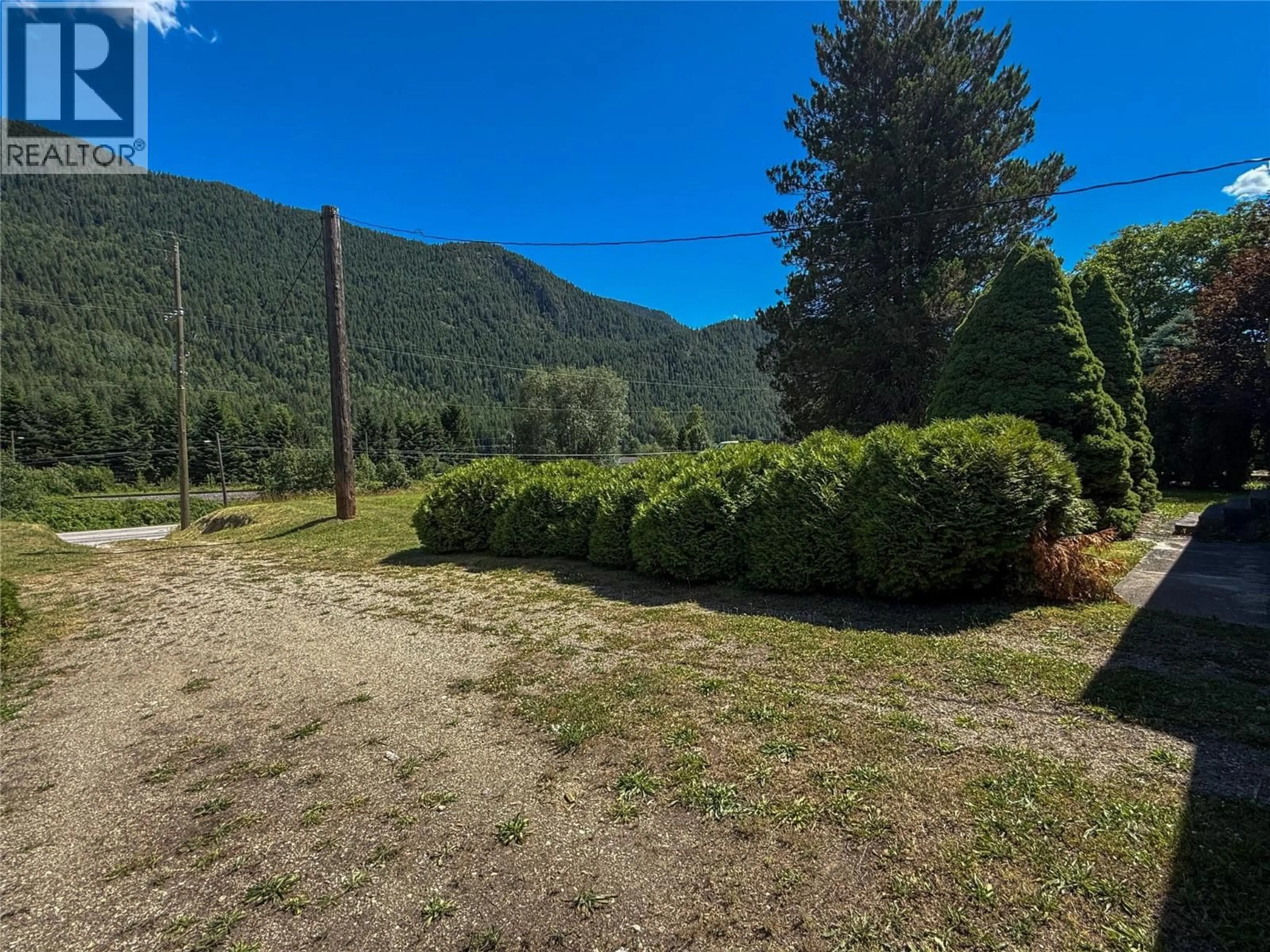 A pic from outside/outdoor area/front of a property/back of a property/a pic from drone, forest/trees view for 1535 HIGHWAY 3A HIGHWAY, Thrums British Columbia V1N4M7