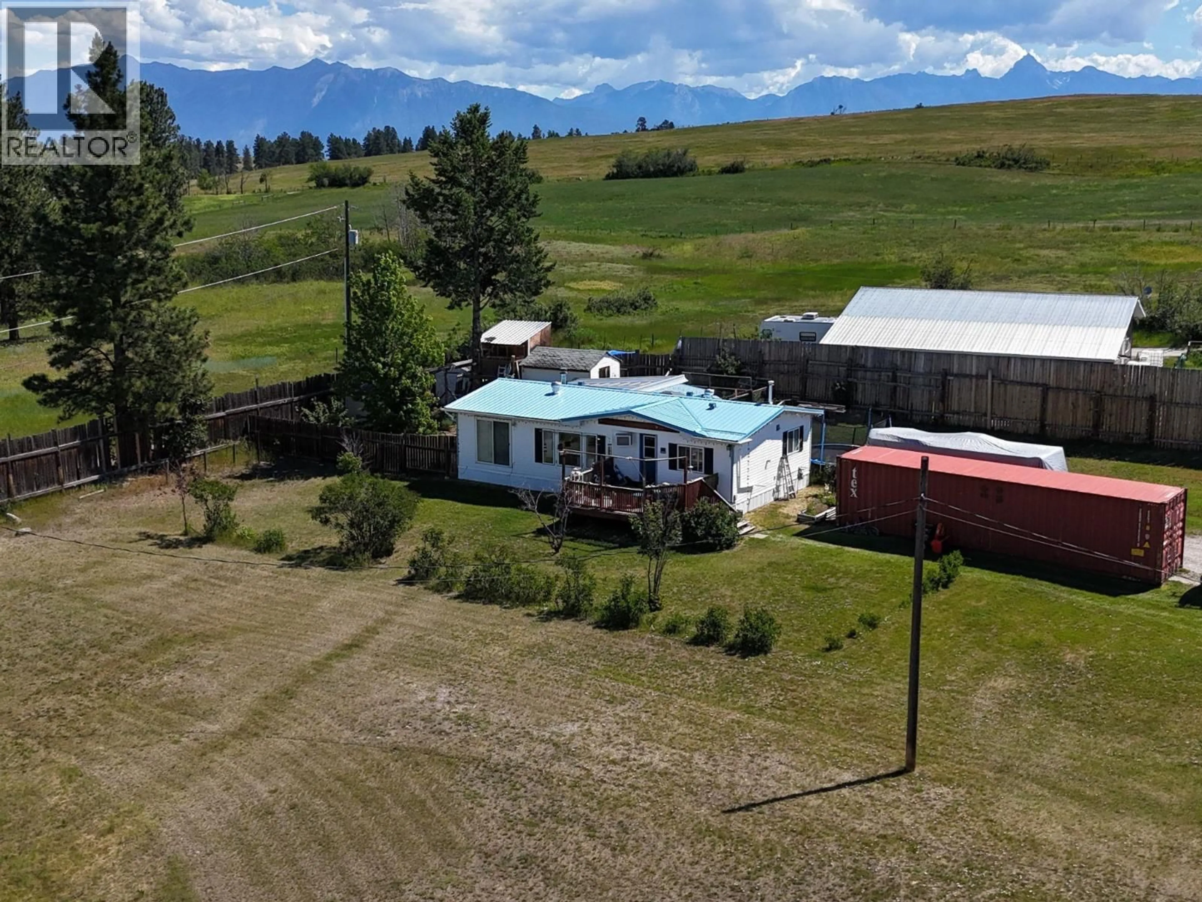 A pic from outside/outdoor area/front of a property/back of a property/a pic from drone, mountain view for 16 - 9762 ERMACORA ROAD, Cranbrook British Columbia V1C7E1