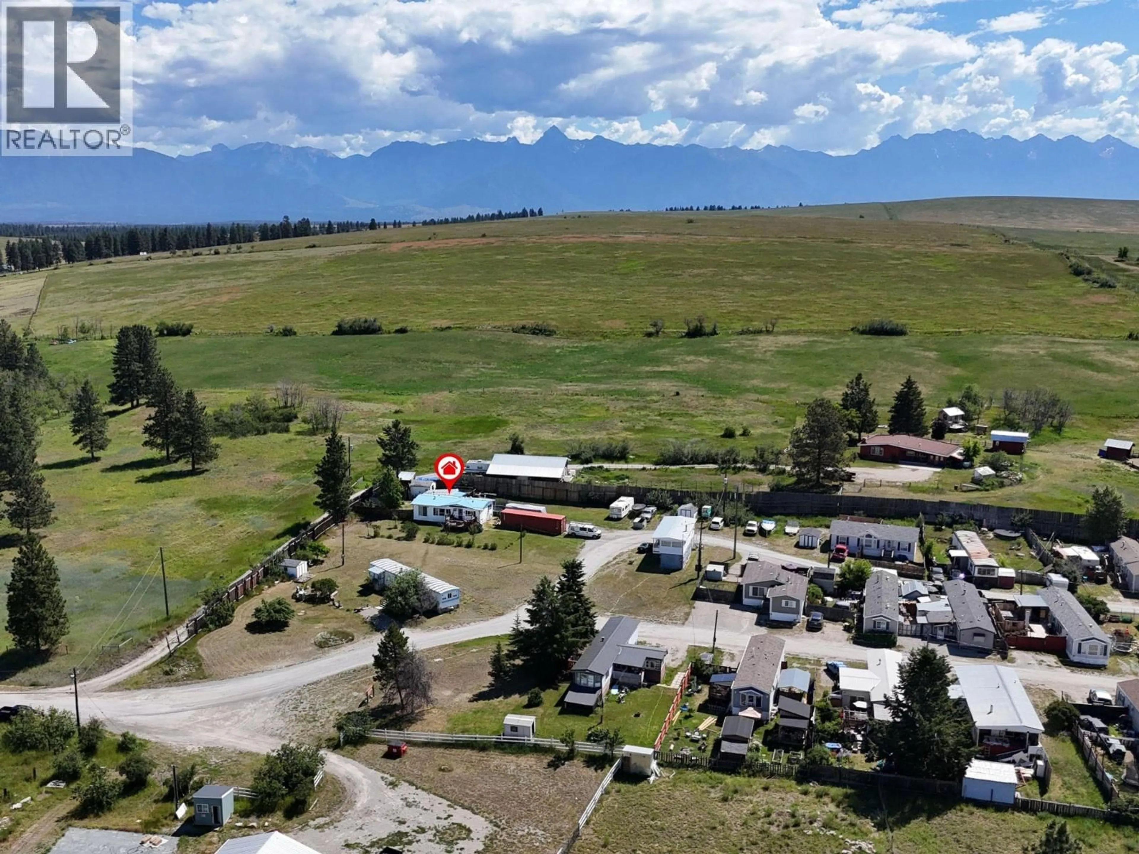 A pic from outside/outdoor area/front of a property/back of a property/a pic from drone, mountain view for 16 - 9762 ERMACORA ROAD, Cranbrook British Columbia V1C7E1