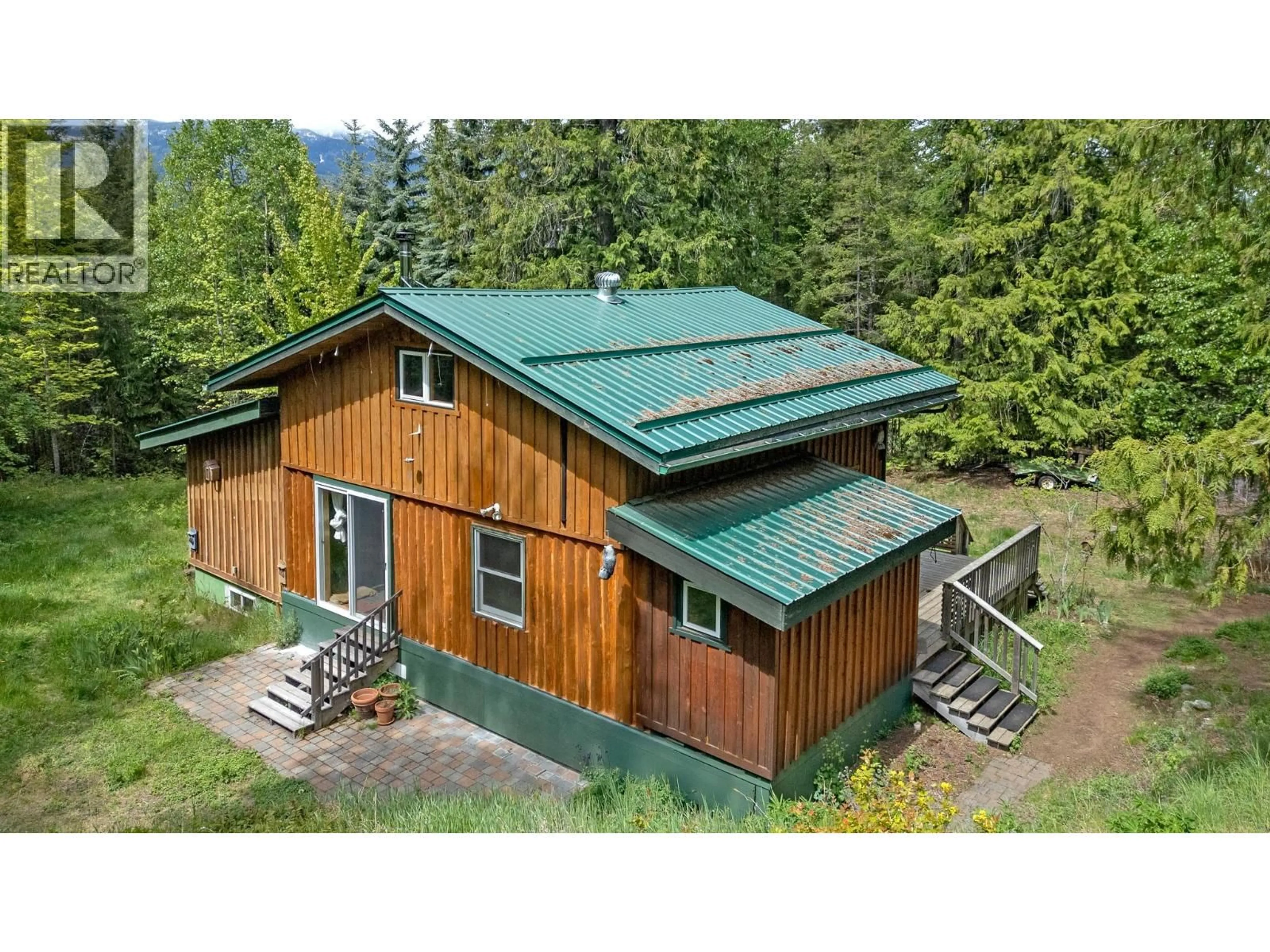 A pic from outside/outdoor area/front of a property/back of a property/a pic from drone, building for 899 COLEMAN ROAD, Riondel British Columbia V0B2B0