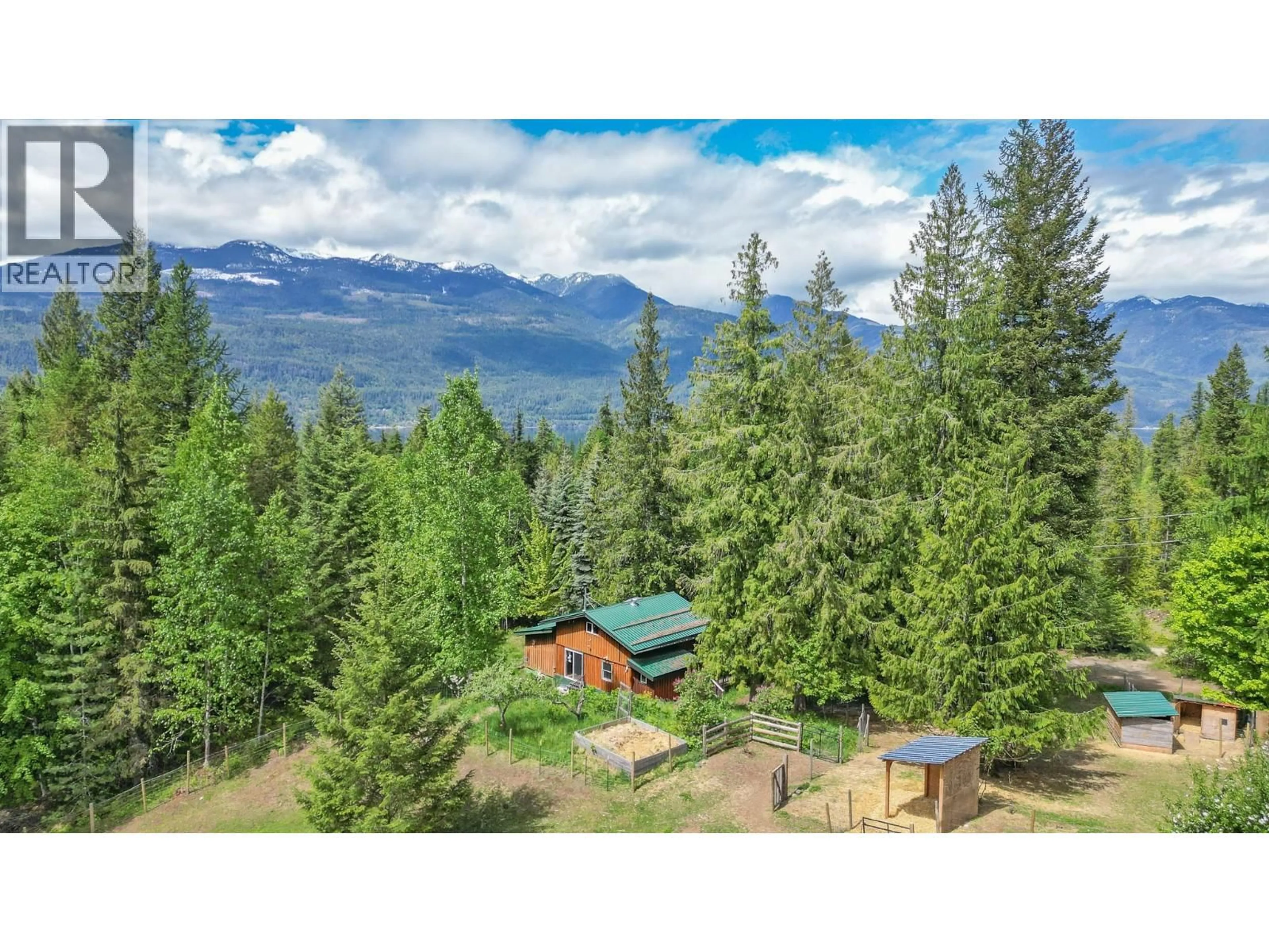 A pic from outside/outdoor area/front of a property/back of a property/a pic from drone, forest/trees view for 899 COLEMAN ROAD, Riondel British Columbia V0B2B0