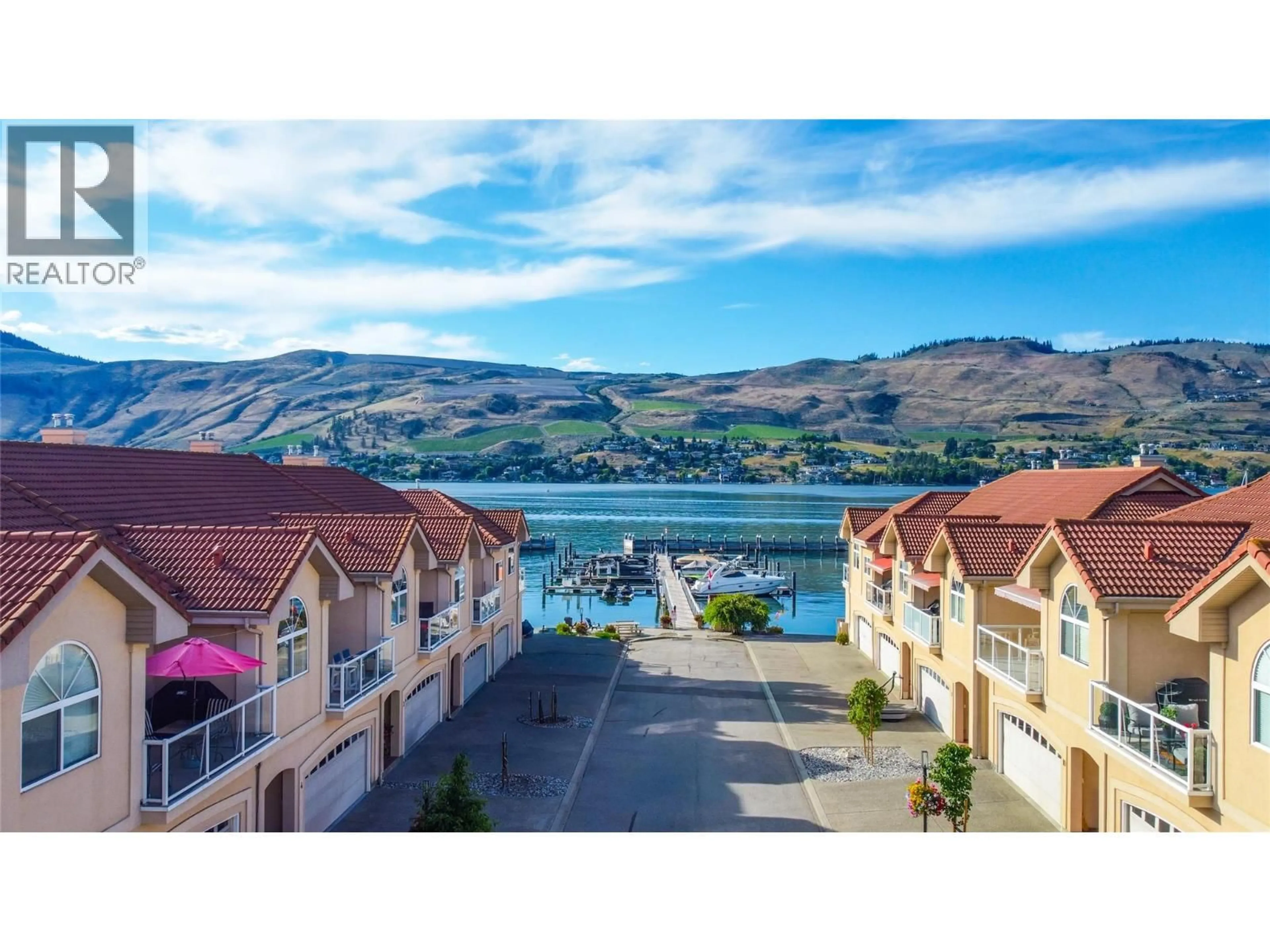 A pic from outside/outdoor area/front of a property/back of a property/a pic from drone, water/lake/river/ocean view for 3 - 7701 OKANAGAN LANDING ROAD, Vernon British Columbia V1H1H2