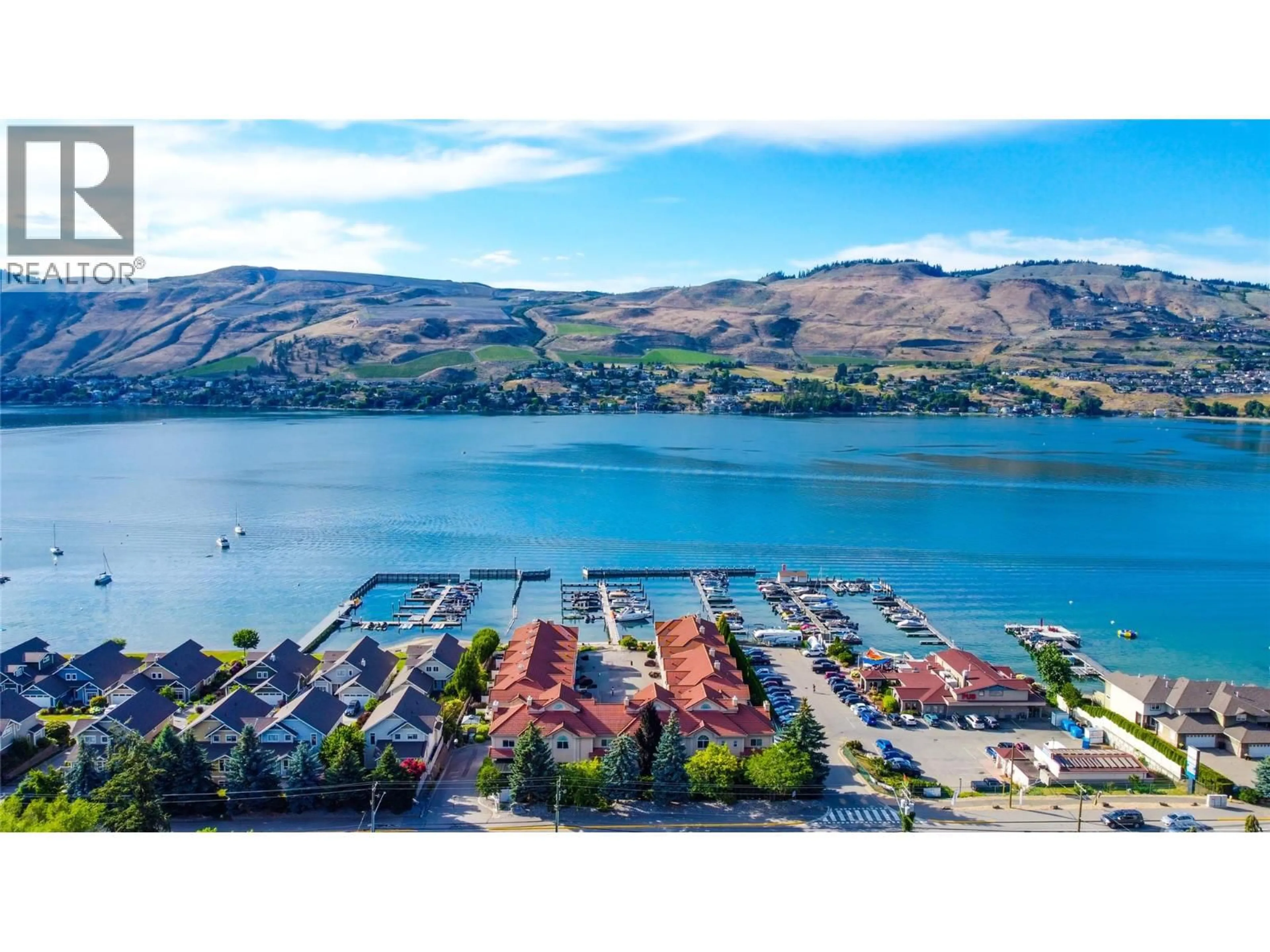 A pic from outside/outdoor area/front of a property/back of a property/a pic from drone, water/lake/river/ocean view for 3 - 7701 OKANAGAN LANDING ROAD, Vernon British Columbia V1H1H2