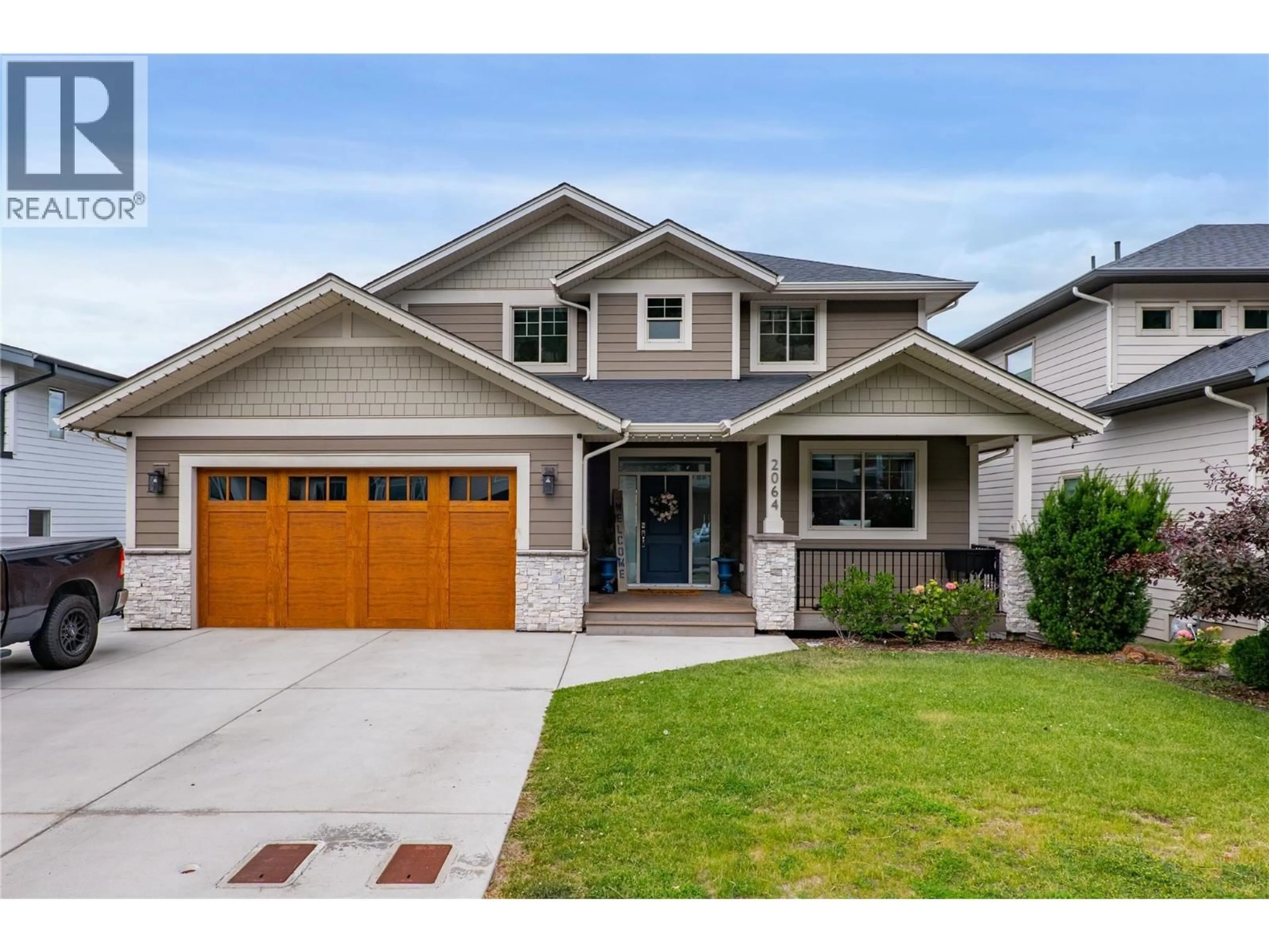 Home with vinyl exterior material, street for 2064 GALORE CRESCENT, Kamloops British Columbia V2E0A7