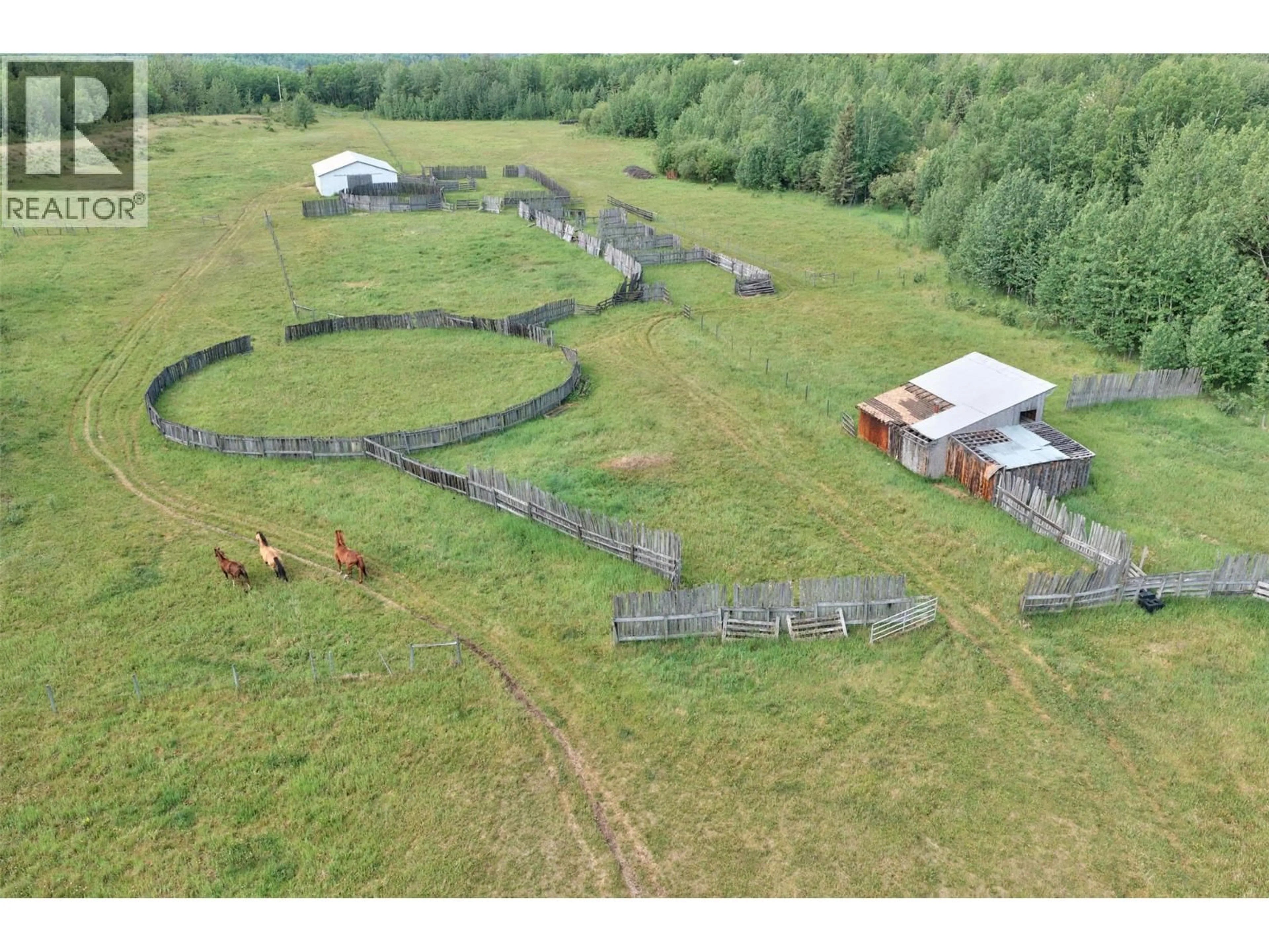A pic from outside/outdoor area/front of a property/back of a property/a pic from drone, building for 562 WILLIS ROAD, Chetwynd British Columbia V0C1J0