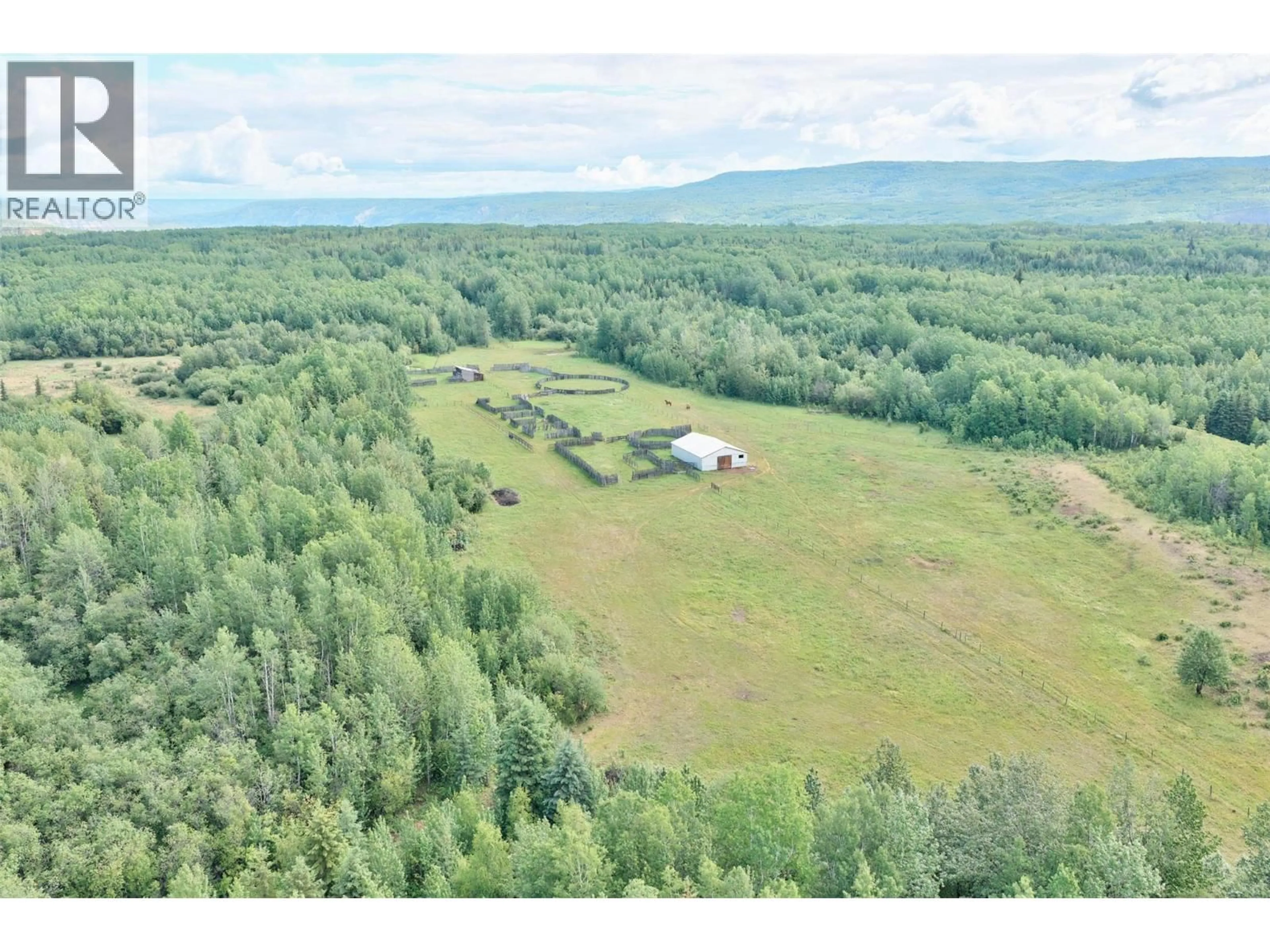A pic from outside/outdoor area/front of a property/back of a property/a pic from drone, forest/trees view for 562 WILLIS ROAD, Chetwynd British Columbia V0C1J0