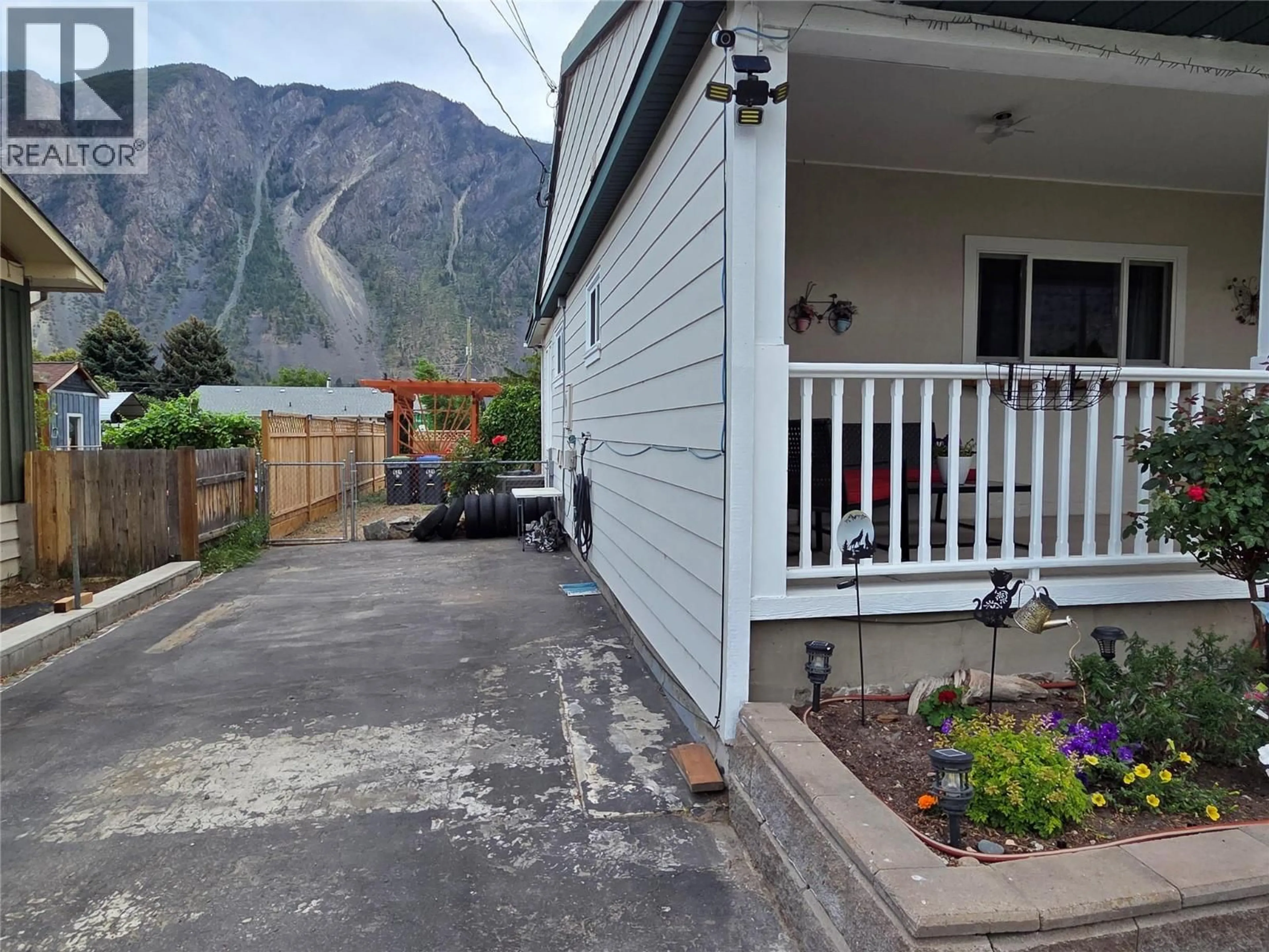 A pic from outside/outdoor area/front of a property/back of a property/a pic from drone, mountain view for 621 10TH AVENUE, Keremeos British Columbia V0X1N3