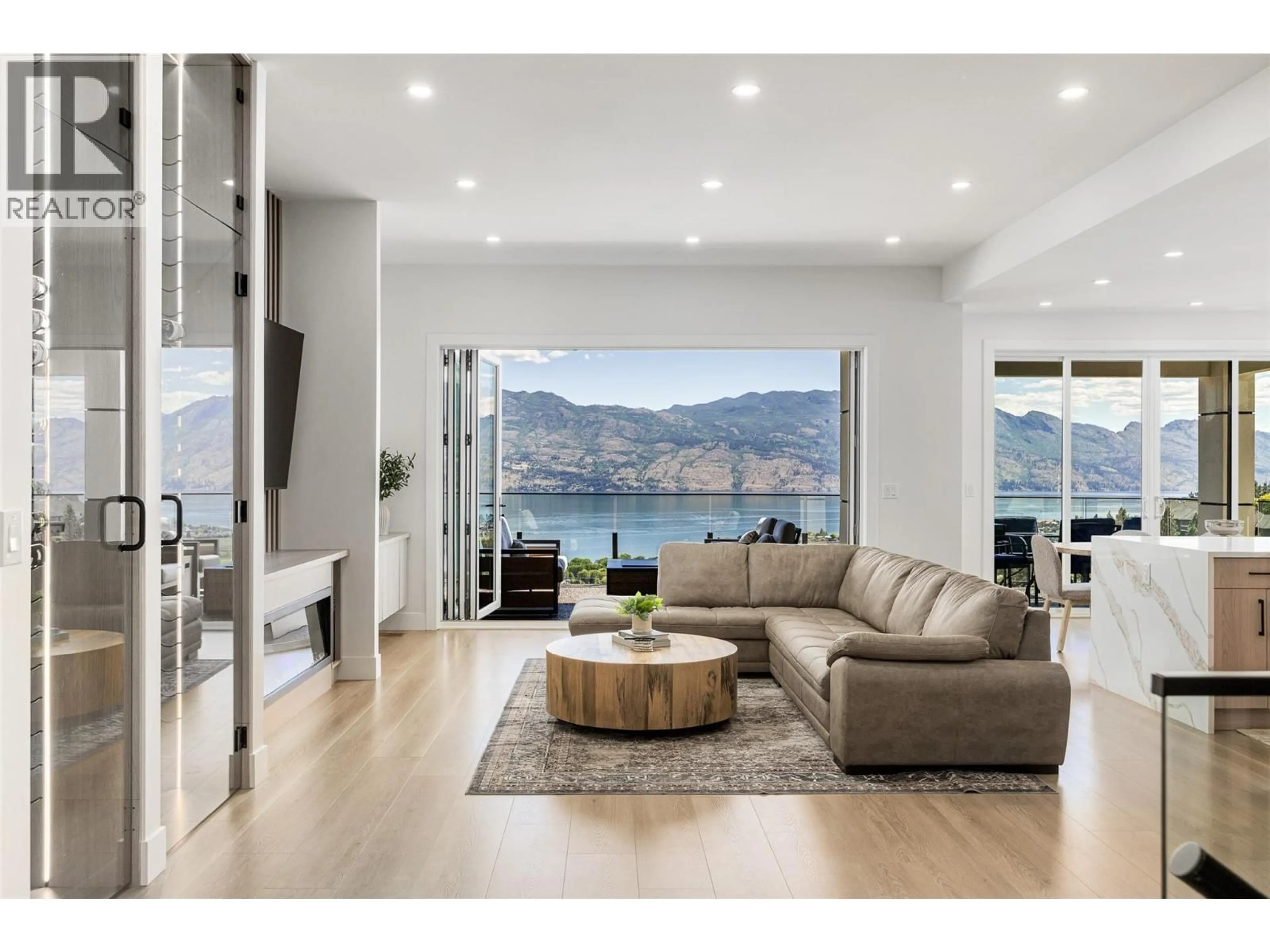Living room with furniture, wood/laminate floor for 1425 MENU ROAD, West Kelowna British Columbia V4T2R9