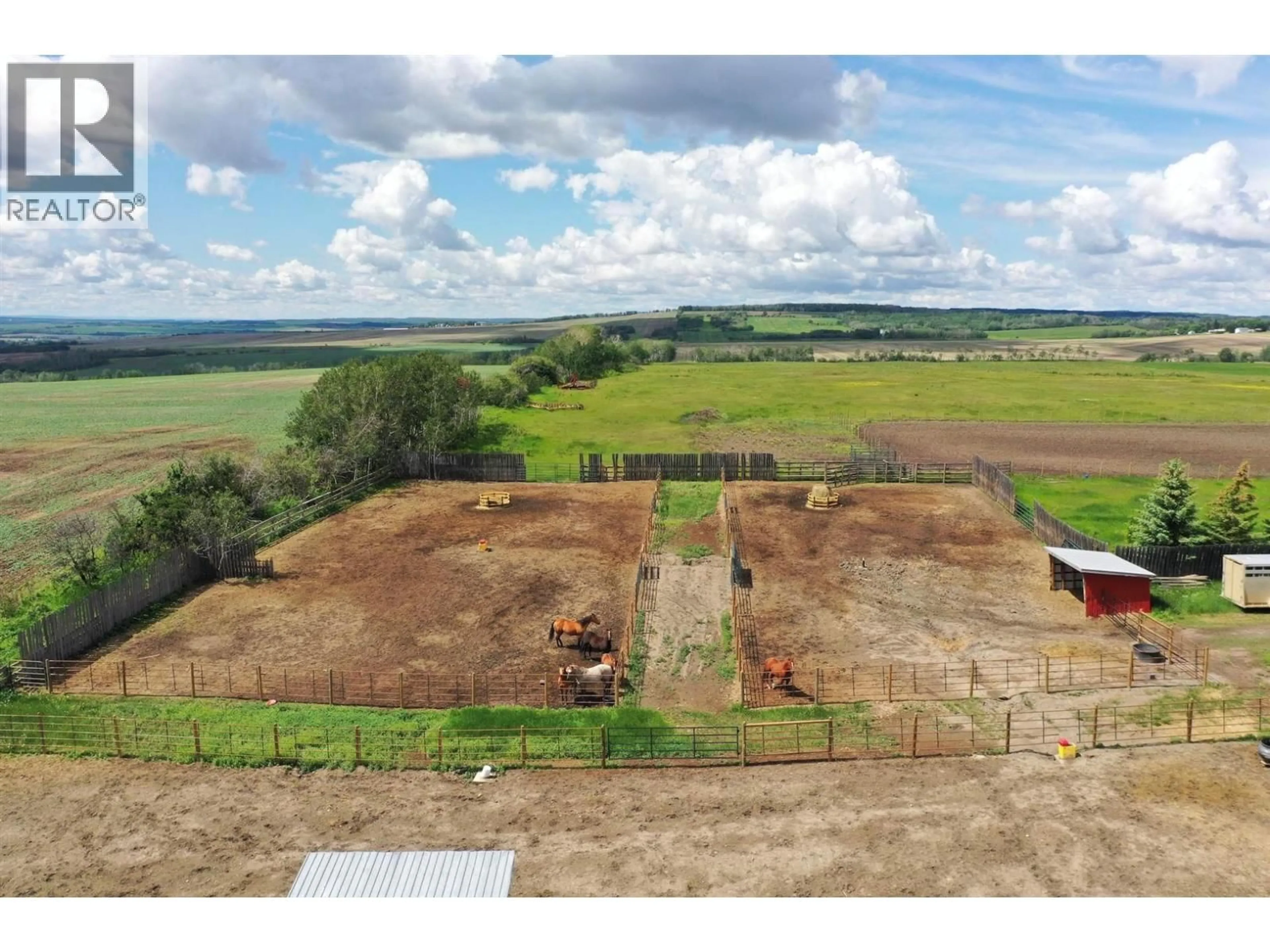 A pic from outside/outdoor area/front of a property/back of a property/a pic from drone, building for 5883 217 ROAD, Dawson Creek British Columbia V1G0A8