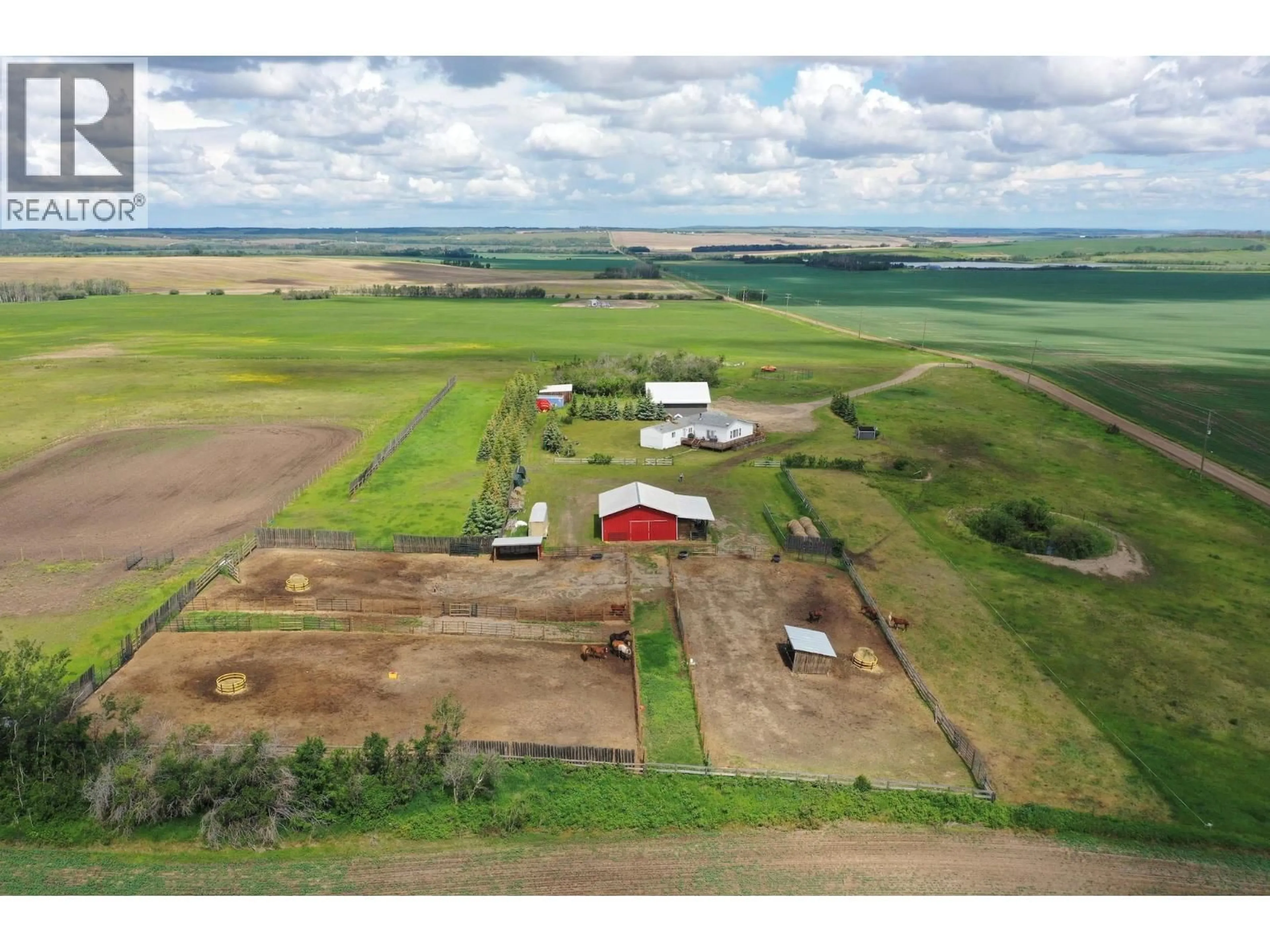 A pic from outside/outdoor area/front of a property/back of a property/a pic from drone, building for 5883 217 ROAD, Dawson Creek British Columbia V1G0A8