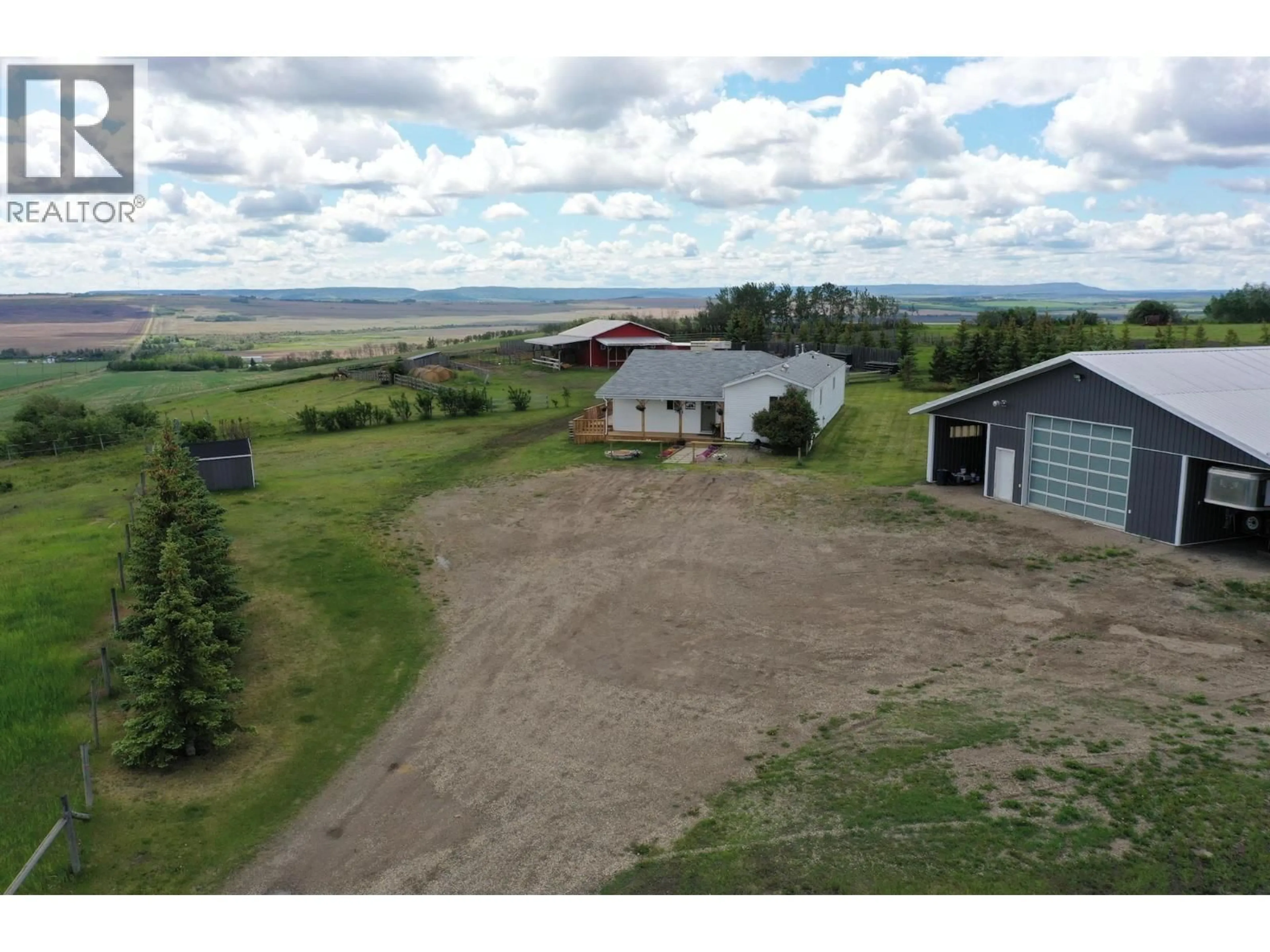 A pic from outside/outdoor area/front of a property/back of a property/a pic from drone, unknown for 5883 217 ROAD, Dawson Creek British Columbia V1G0A8