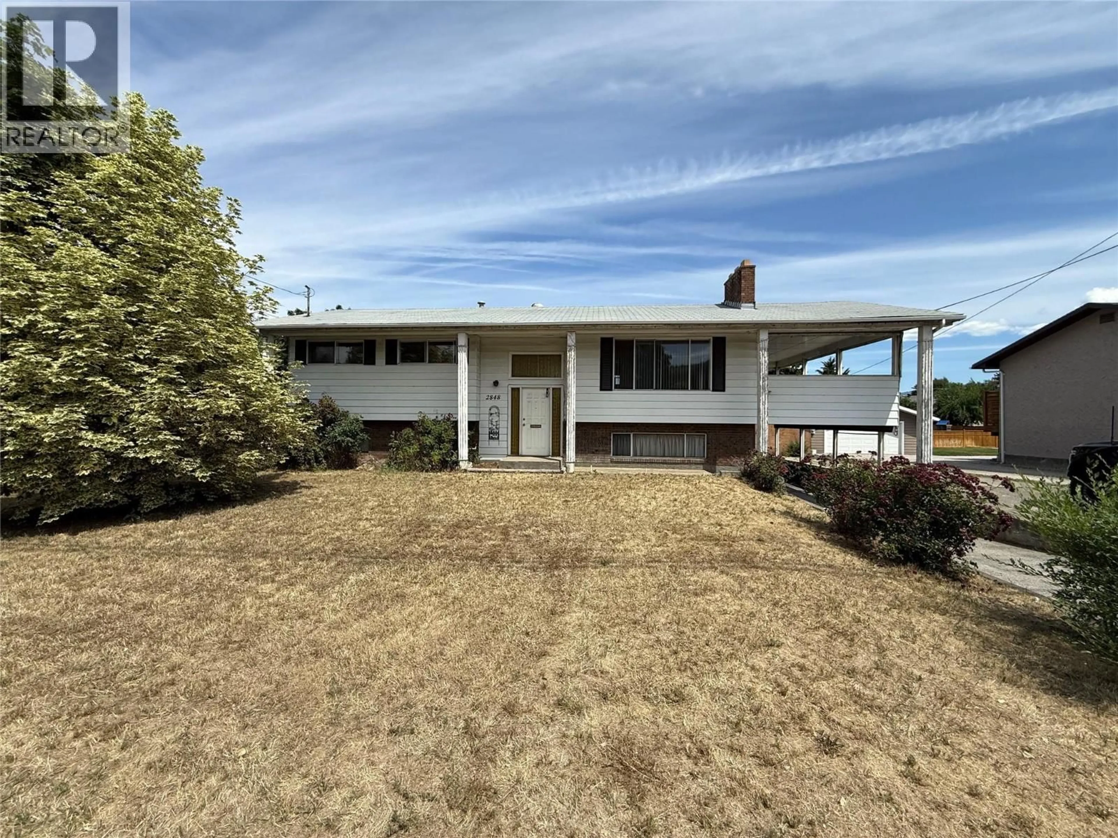 A pic from outside/outdoor area/front of a property/back of a property/a pic from drone, unknown for 2848 SPRINGFIELD ROAD, Kelowna British Columbia