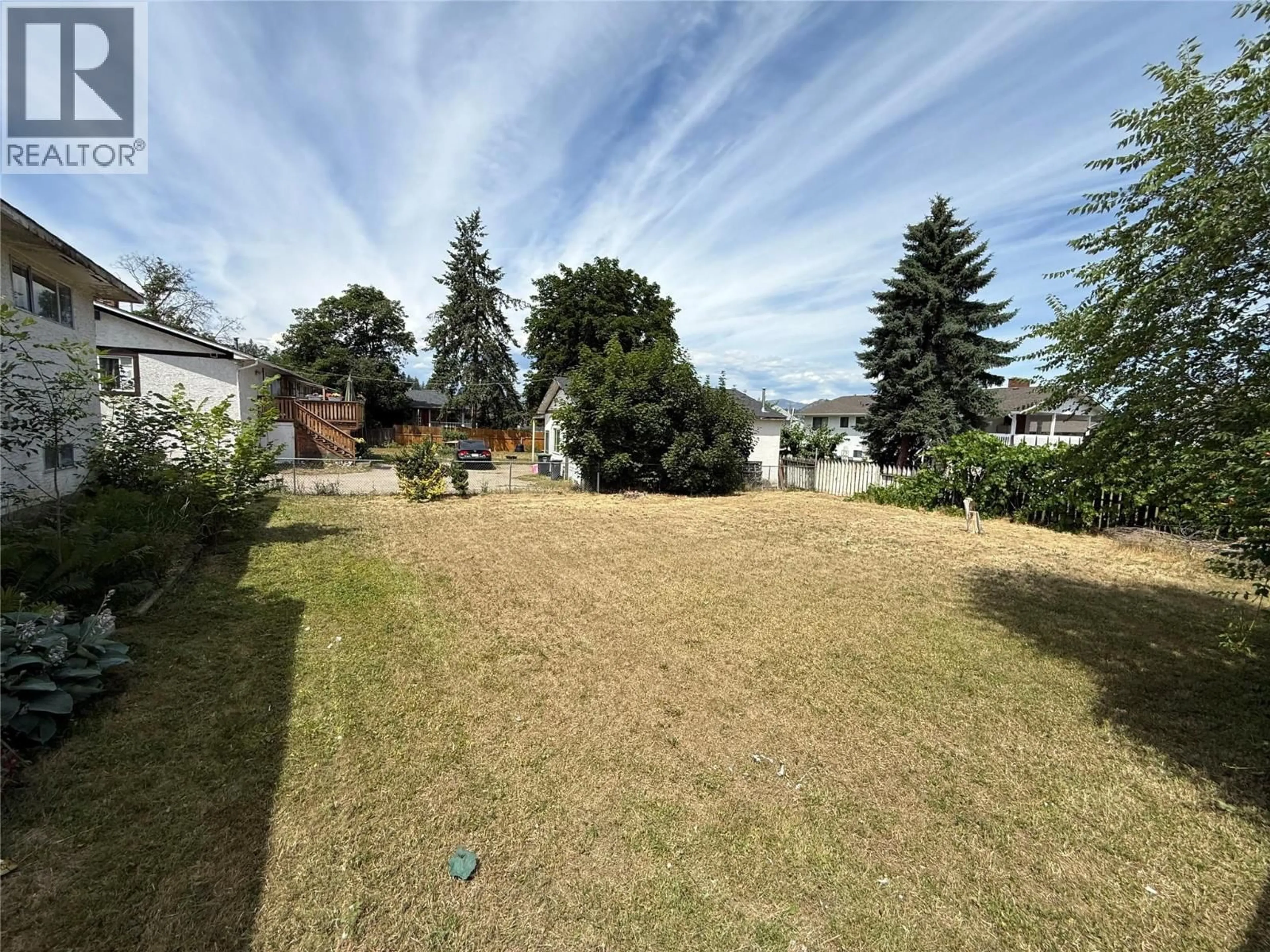 A pic from outside/outdoor area/front of a property/back of a property/a pic from drone, unknown for 2848 SPRINGFIELD ROAD, Kelowna British Columbia