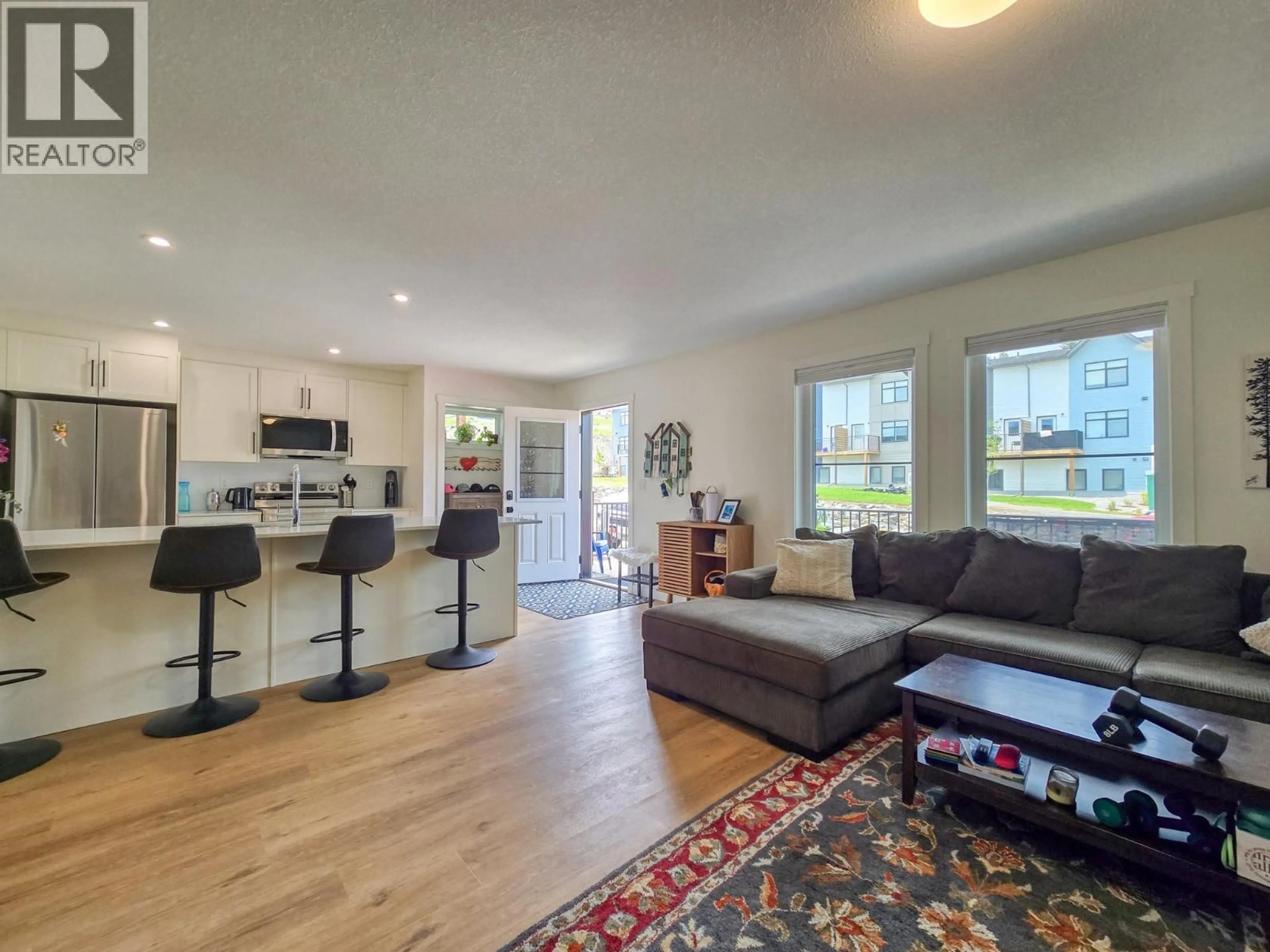 Open concept kitchen, wood/laminate floor for 39 - 2096 PINE TREE LANE, Invermere British Columbia V0A1K4