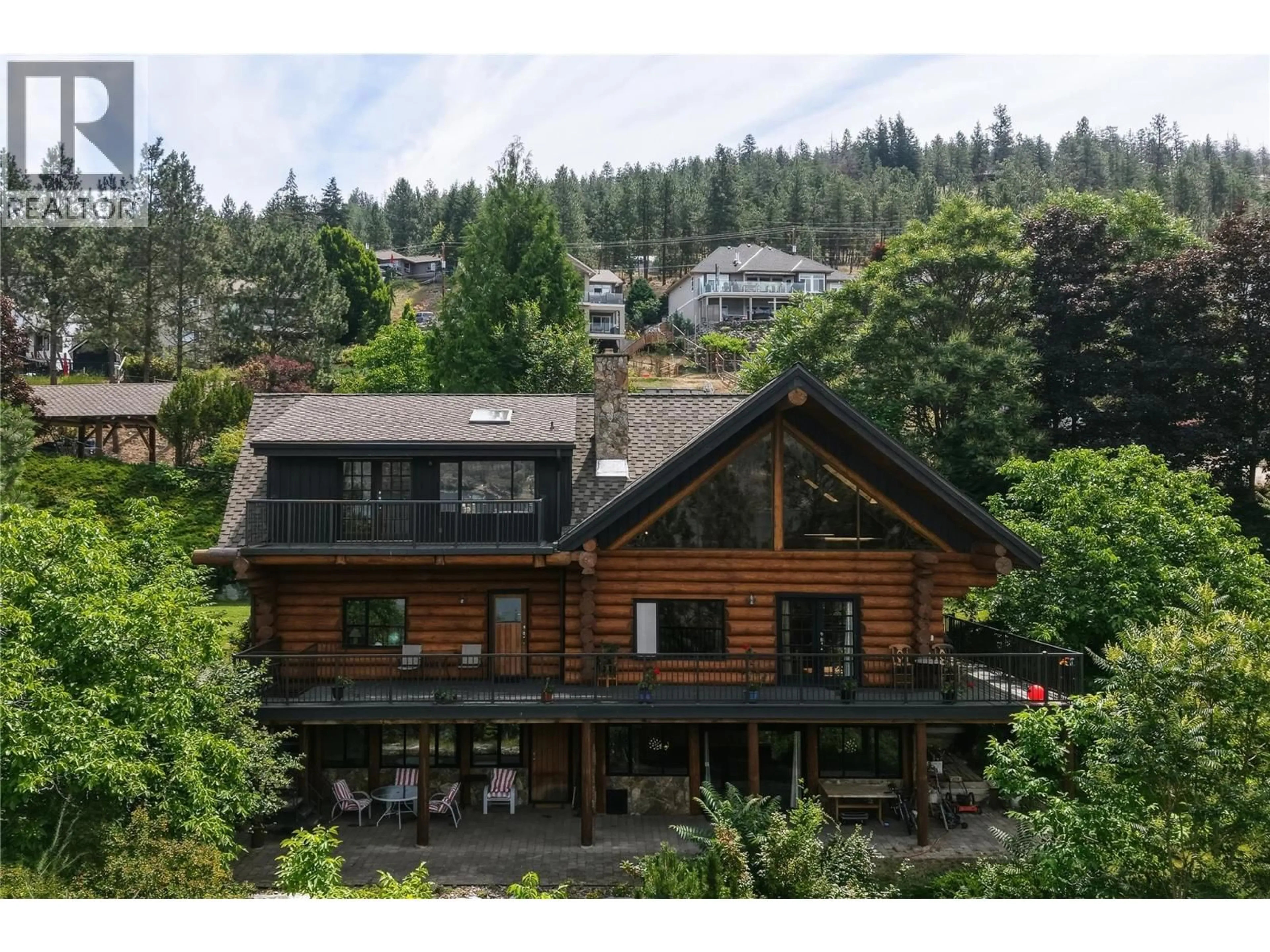 A pic from outside/outdoor area/front of a property/back of a property/a pic from drone, mountain view for 2690 DUBBIN ROAD, Kelowna British Columbia V1V2B8