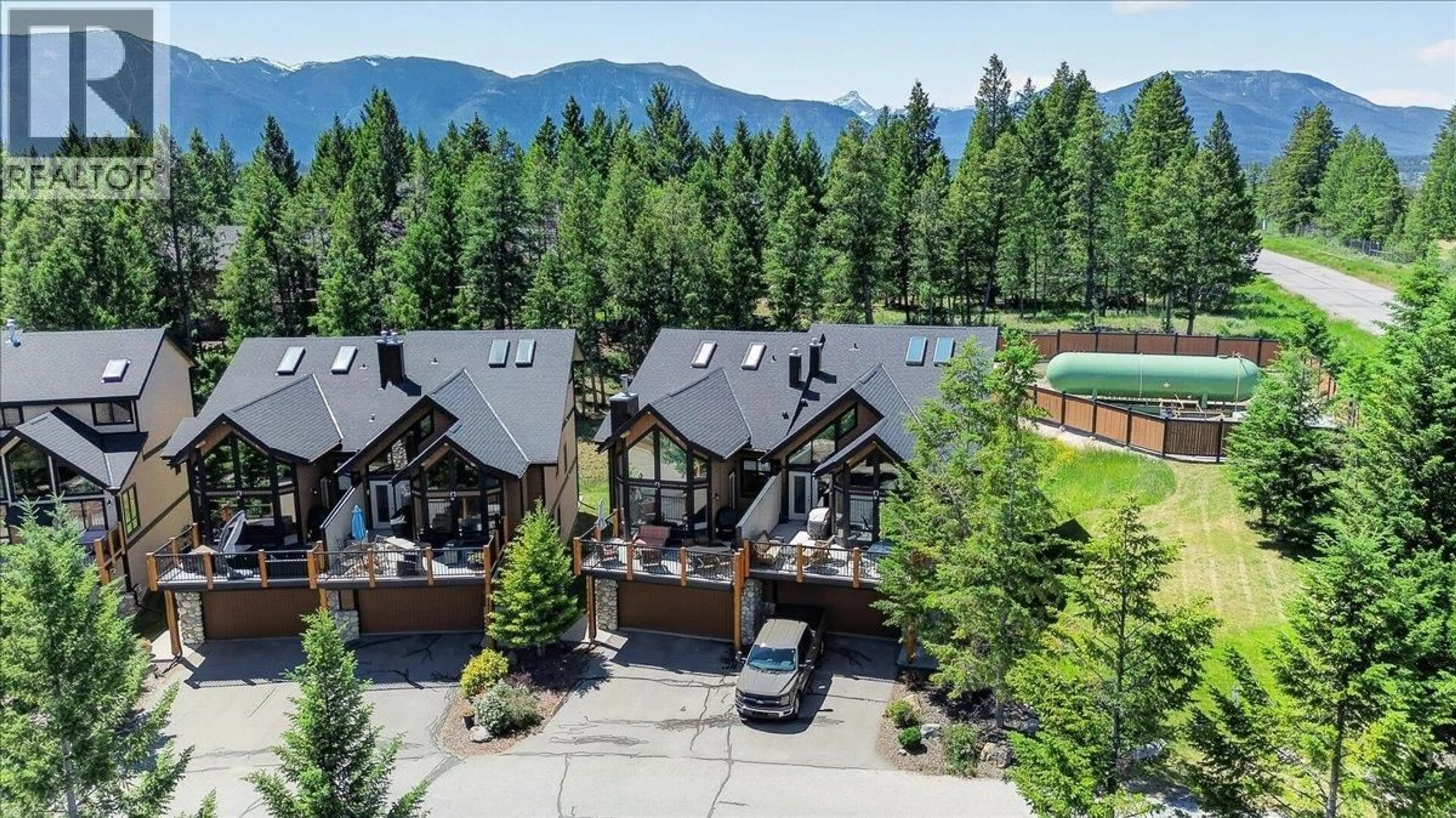 A pic from outside/outdoor area/front of a property/back of a property/a pic from drone, mountain view for 3 - 835 LAKEVIEW DRIVE, Windermere British Columbia V0A1K3