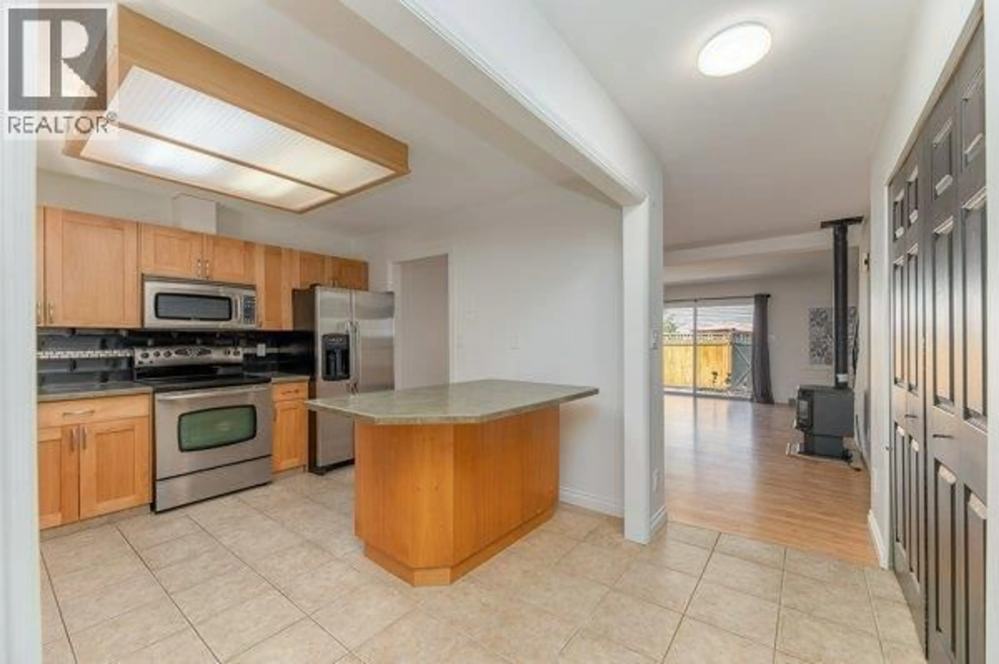 Open concept kitchen, ceramic/tile floor for 113 - 3315 WILSON STREET, Penticton British Columbia v2a8j3