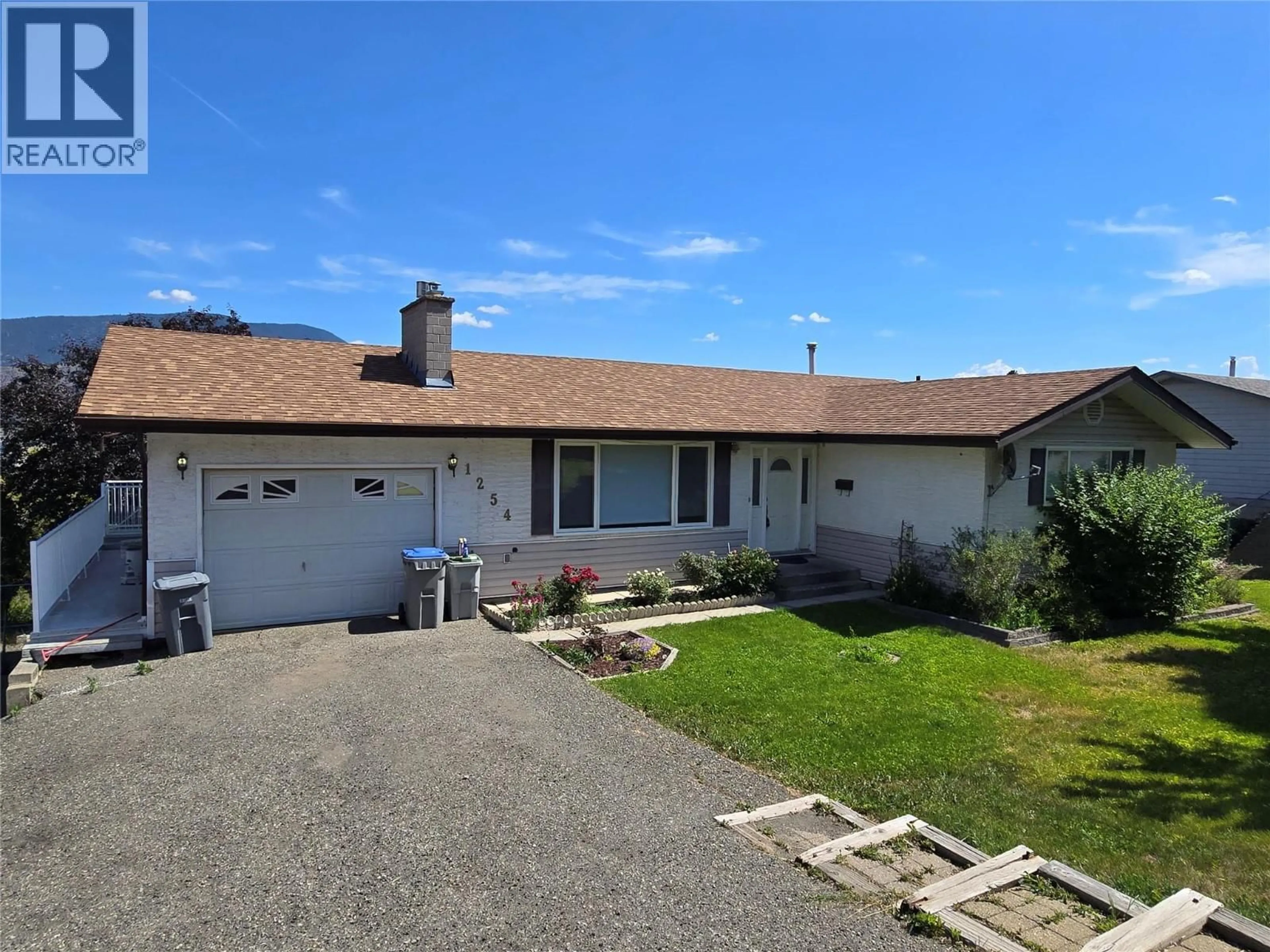 A pic from outside/outdoor area/front of a property/back of a property/a pic from drone, street for 1254 CLEARVIEW DRIVE, Kamloops British Columbia V2C5E5