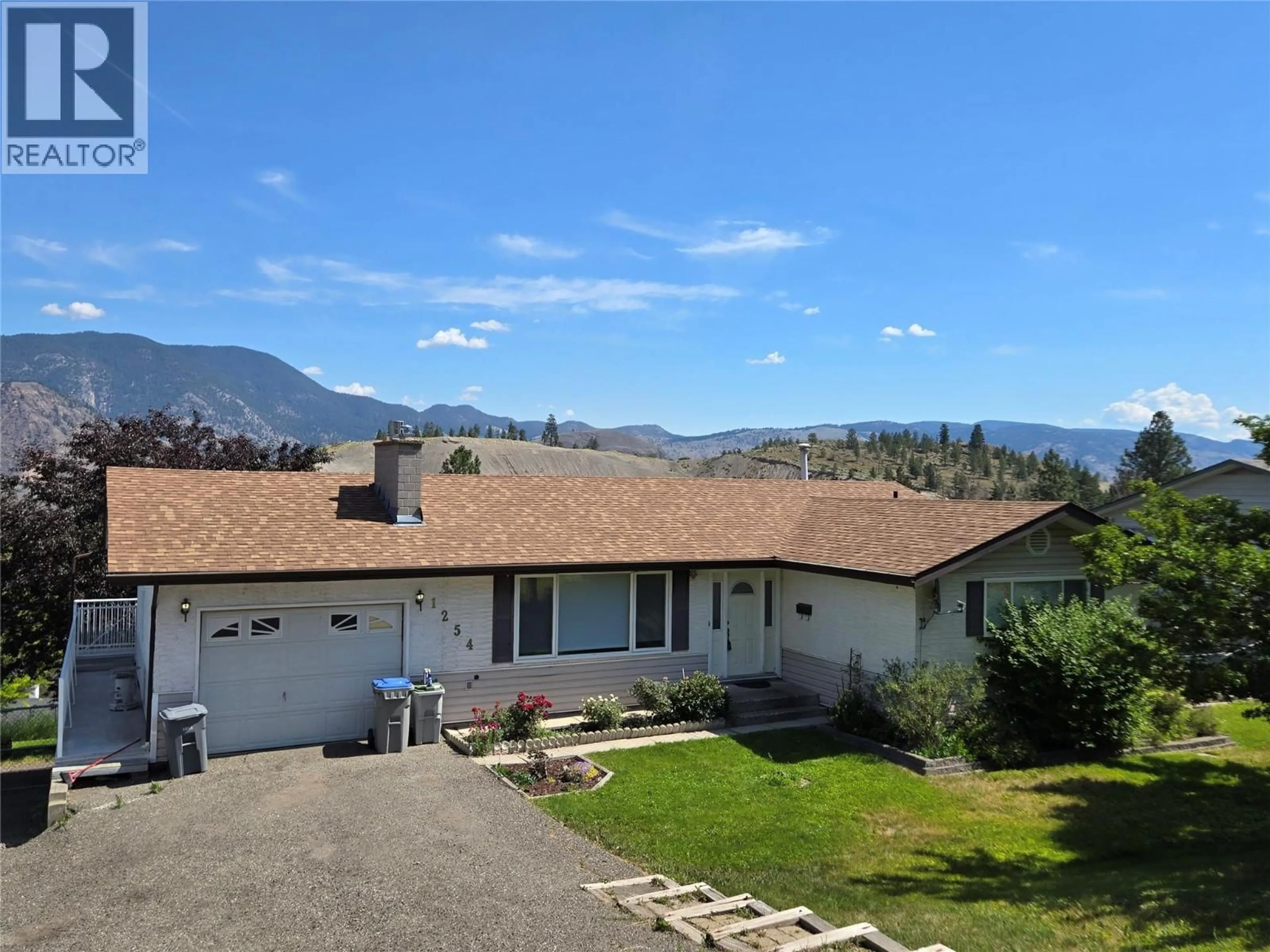 A pic from outside/outdoor area/front of a property/back of a property/a pic from drone, mountain view for 1254 CLEARVIEW DRIVE, Kamloops British Columbia V2C5E5