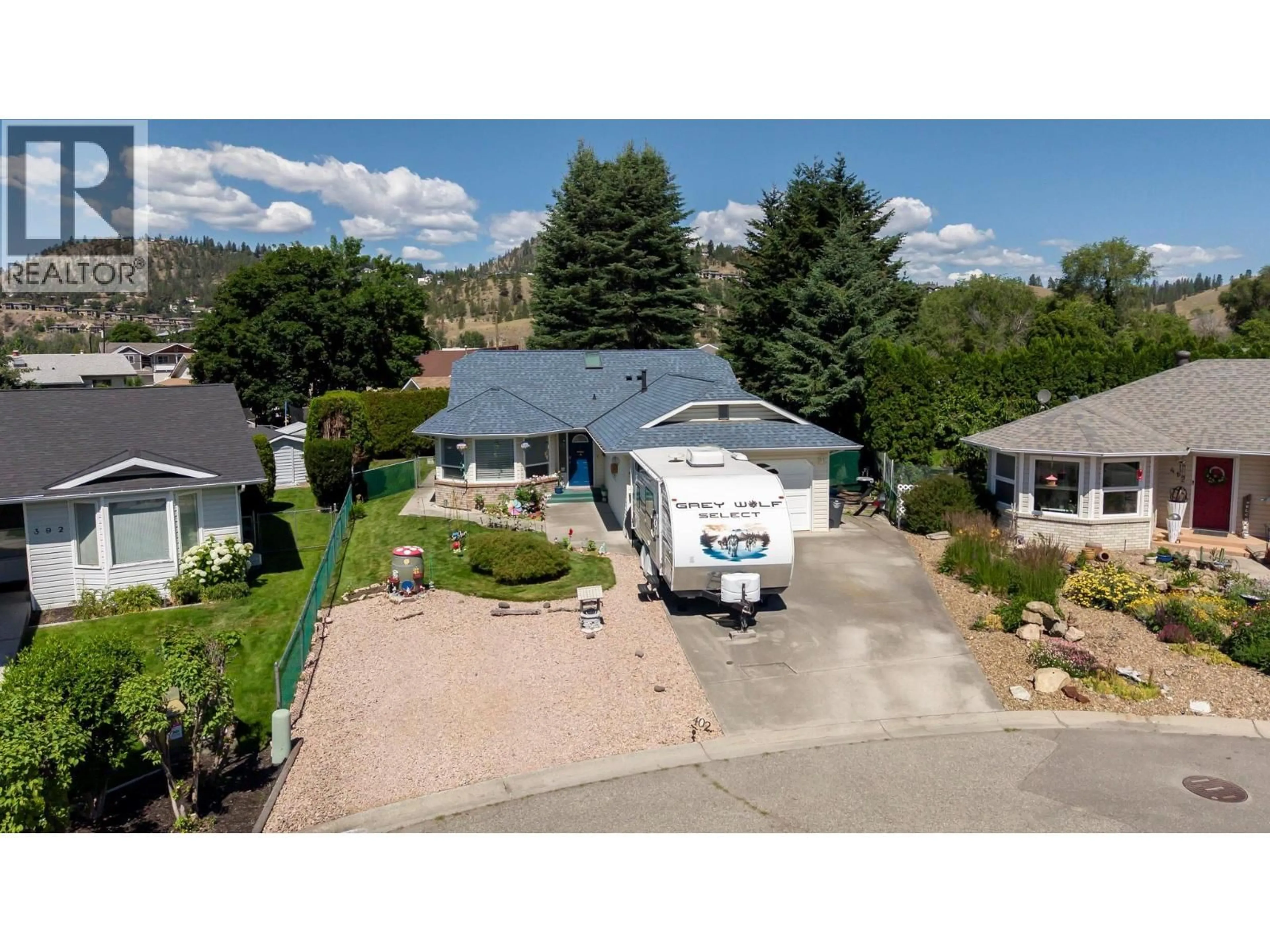 A pic from outside/outdoor area/front of a property/back of a property/a pic from drone, mountain view for 402 HOUGHTON COURT, Kelowna British Columbia V1X7C7